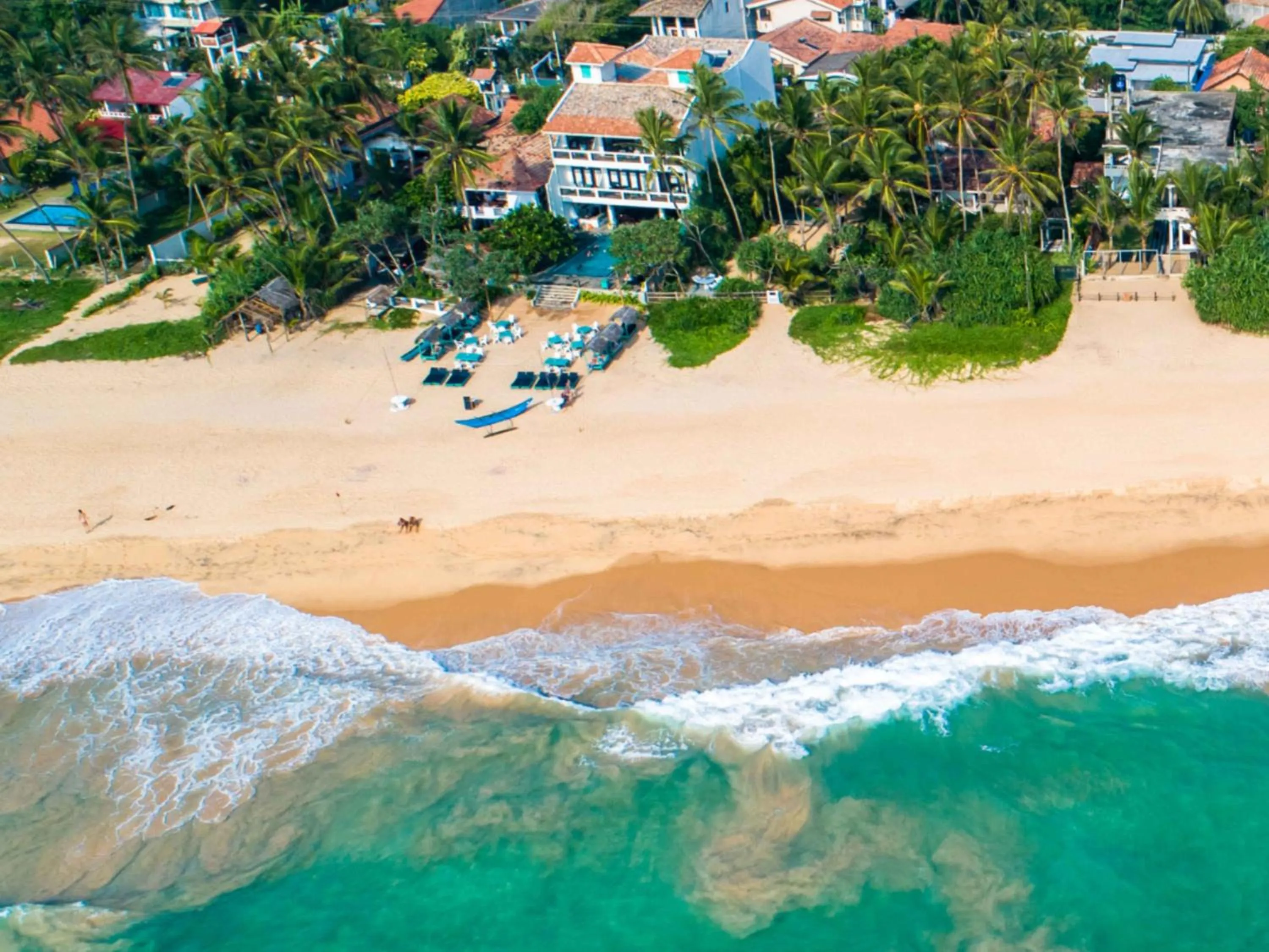 Property building in At Ease Beach Hotel