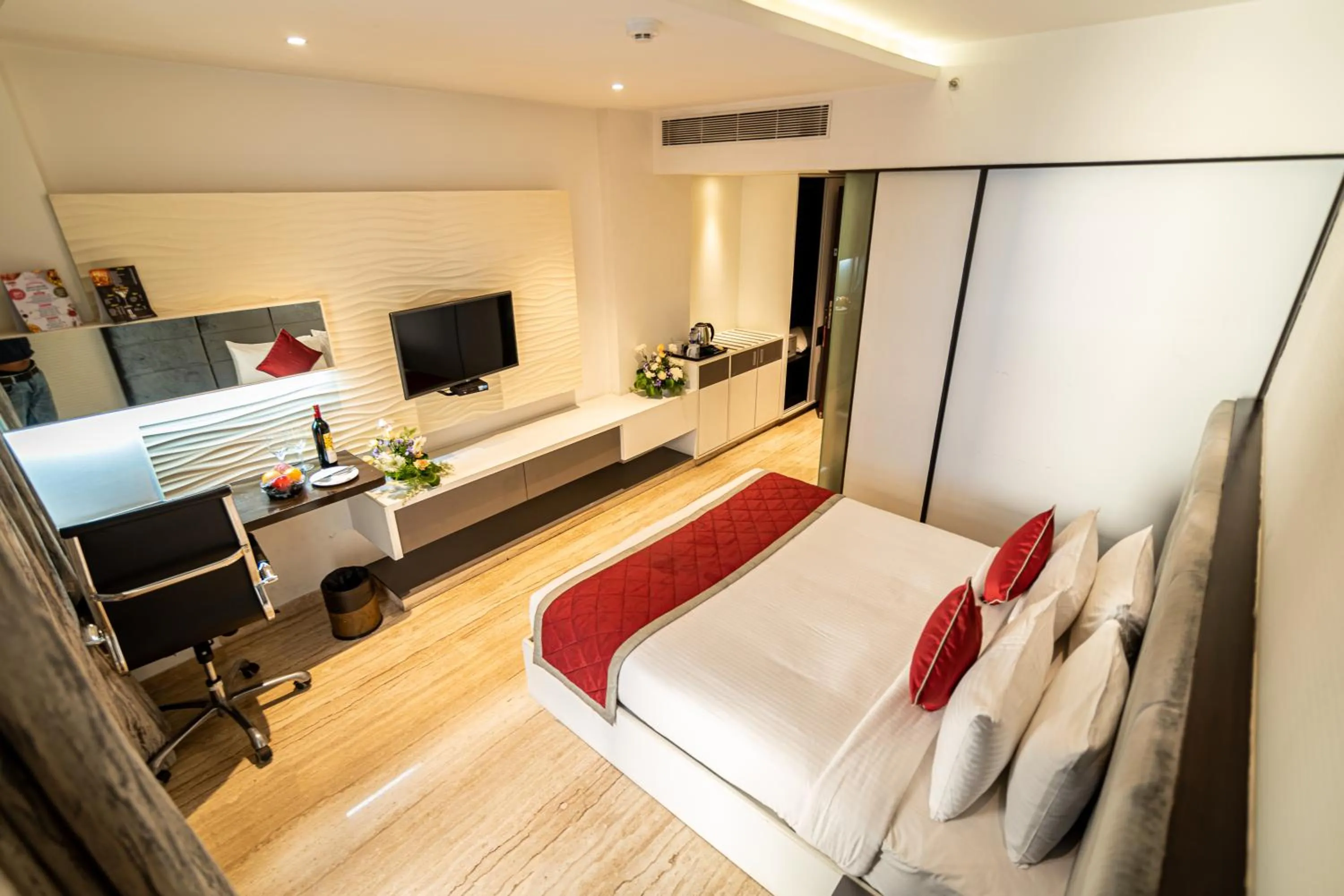 Bed in Bhagini Icon Premier Hotel