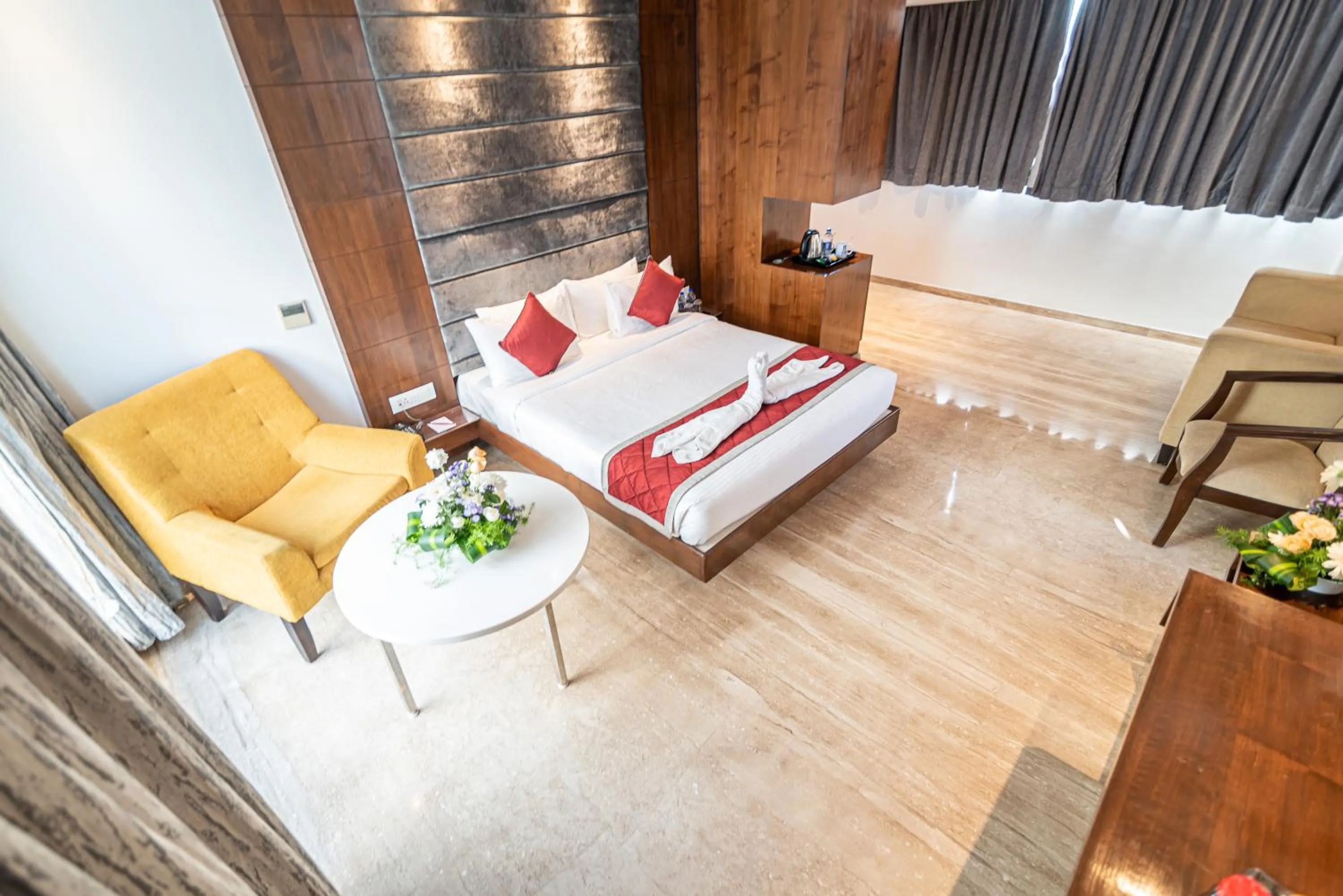 Photo of the whole room, Bed in Bhagini Icon Premier Hotel