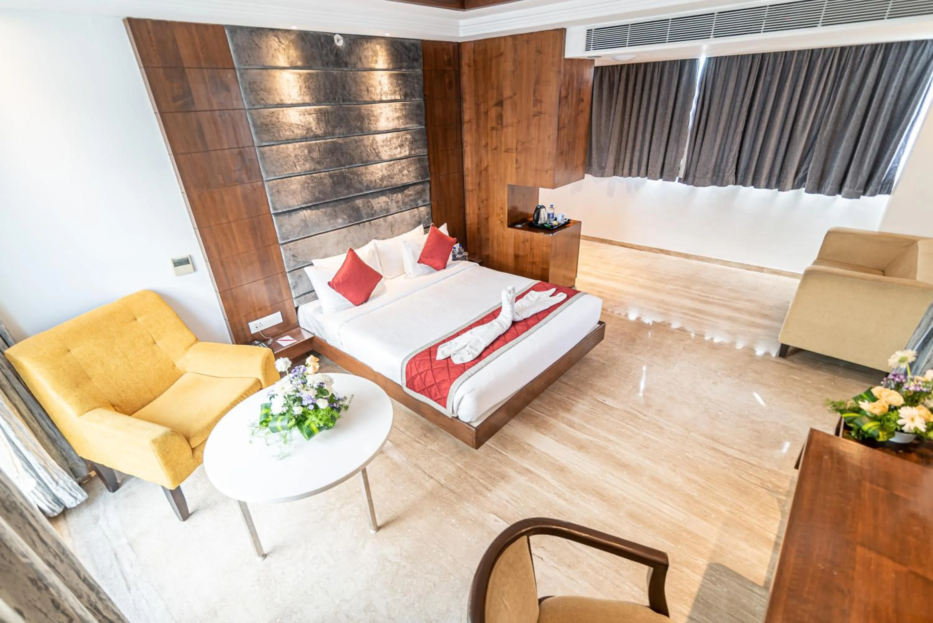 Bed in Bhagini Icon Premier Hotel