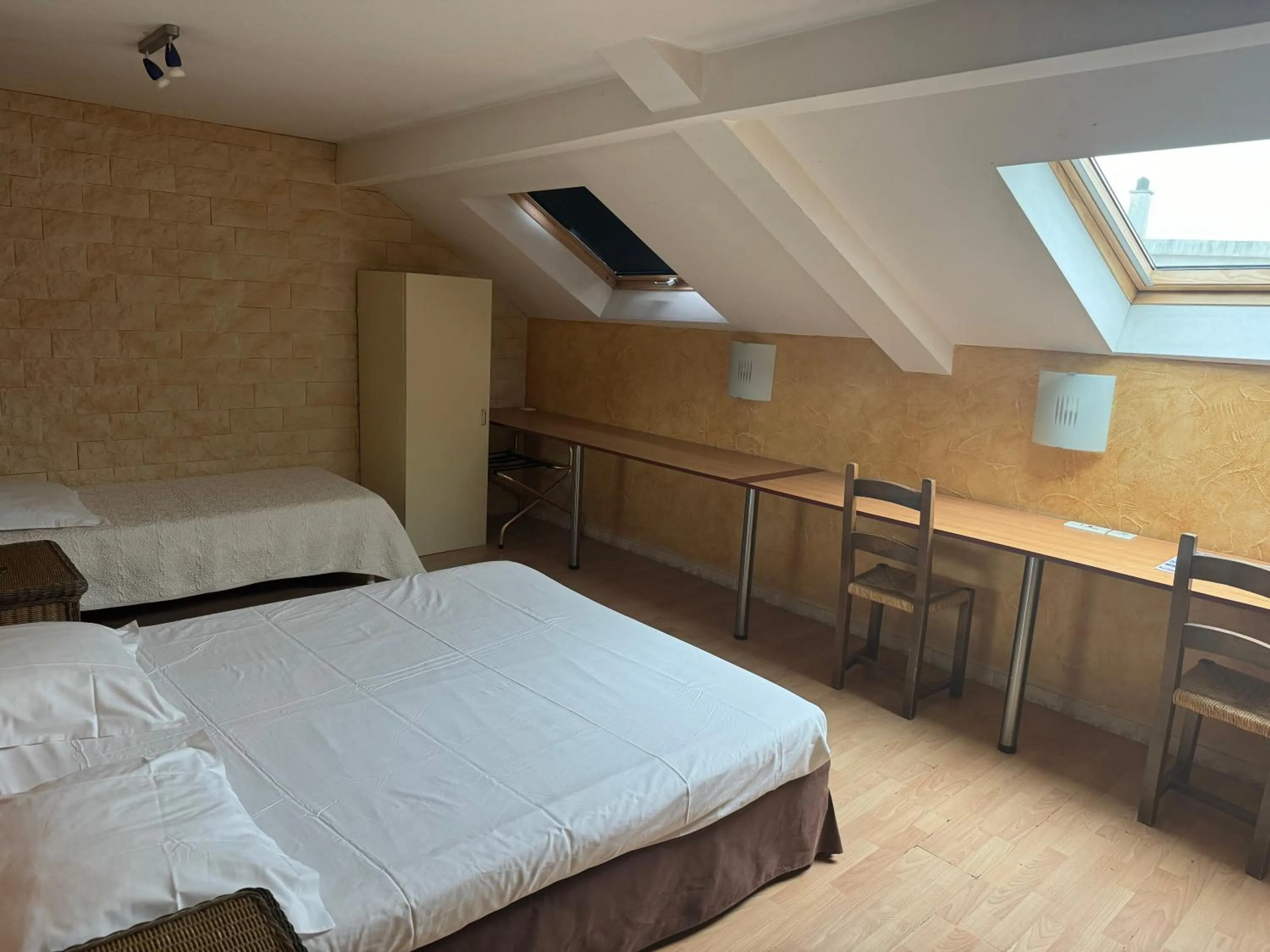 Photo of the whole room, Bed in Hôtel Bosquet Pau Centre - Self Check In Budget Hotel