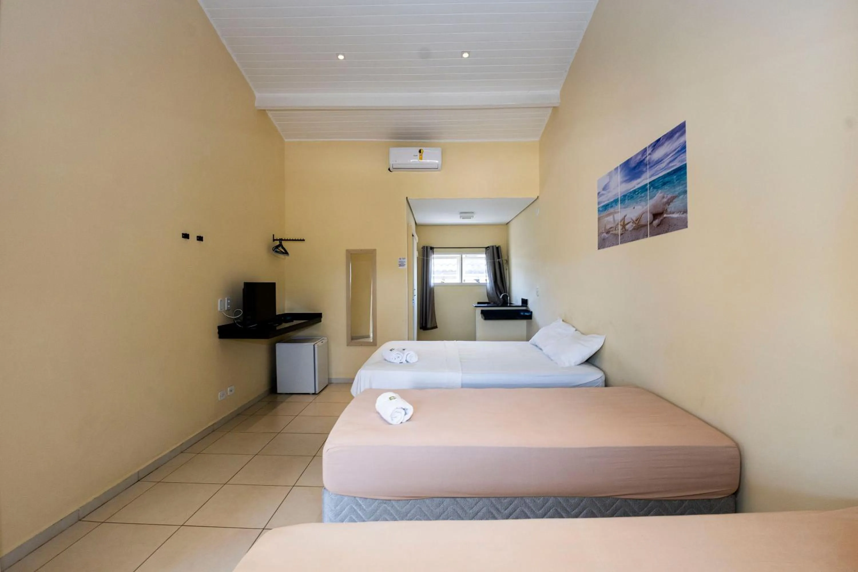 Bed in Pousada Porto do Rio