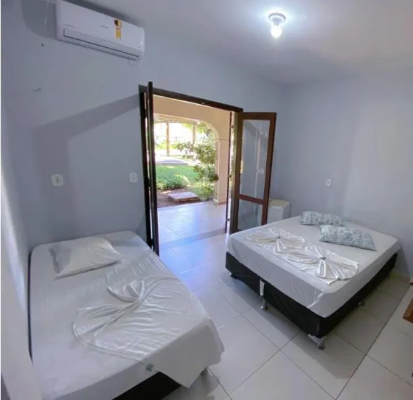 Bed in Pousada Porto do Rio