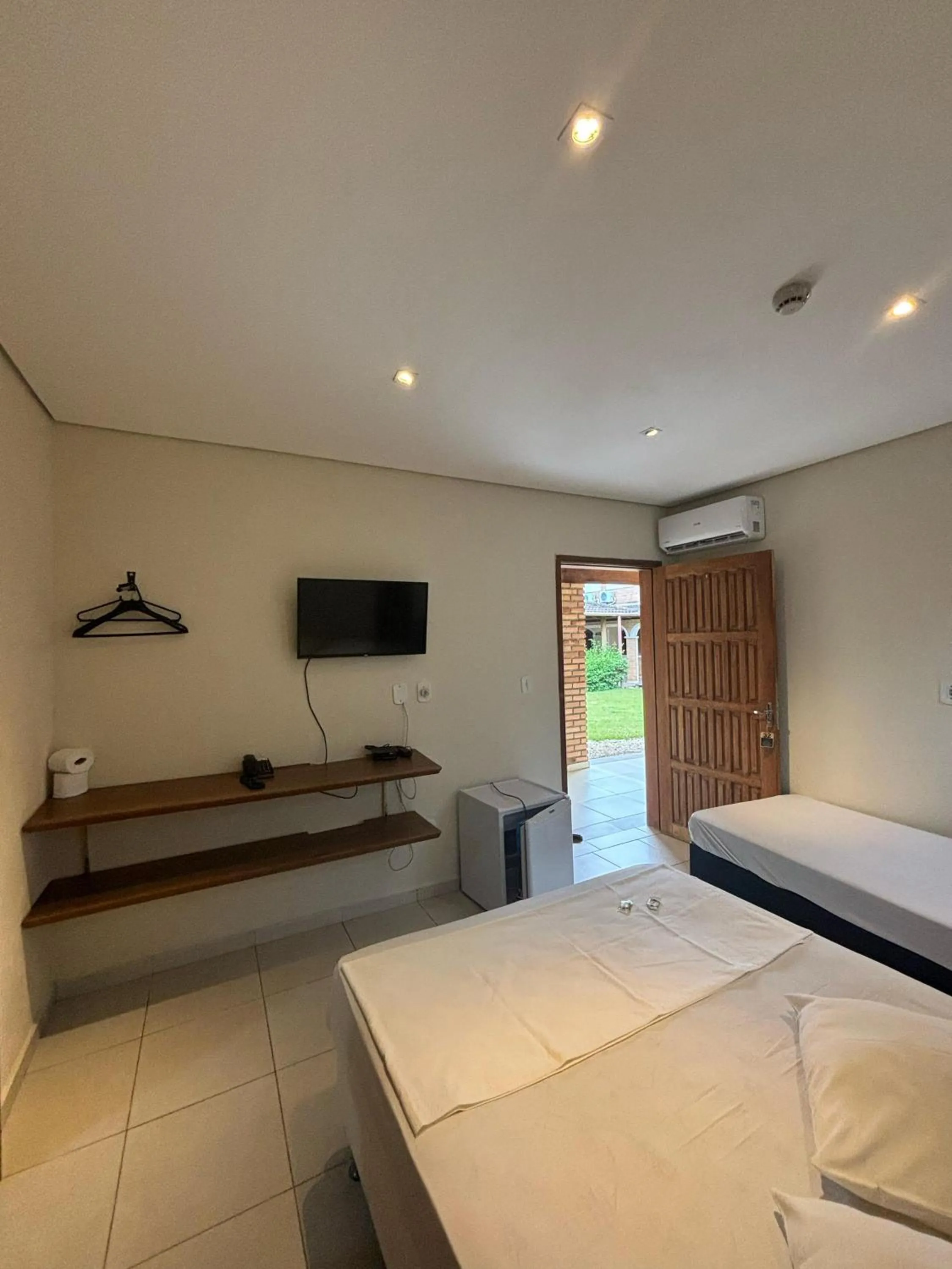 Bed in Pousada Porto do Rio