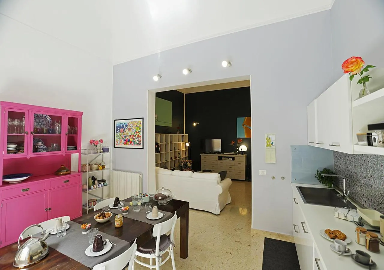 Communal lounge/ TV room in B&B La casa di Paola