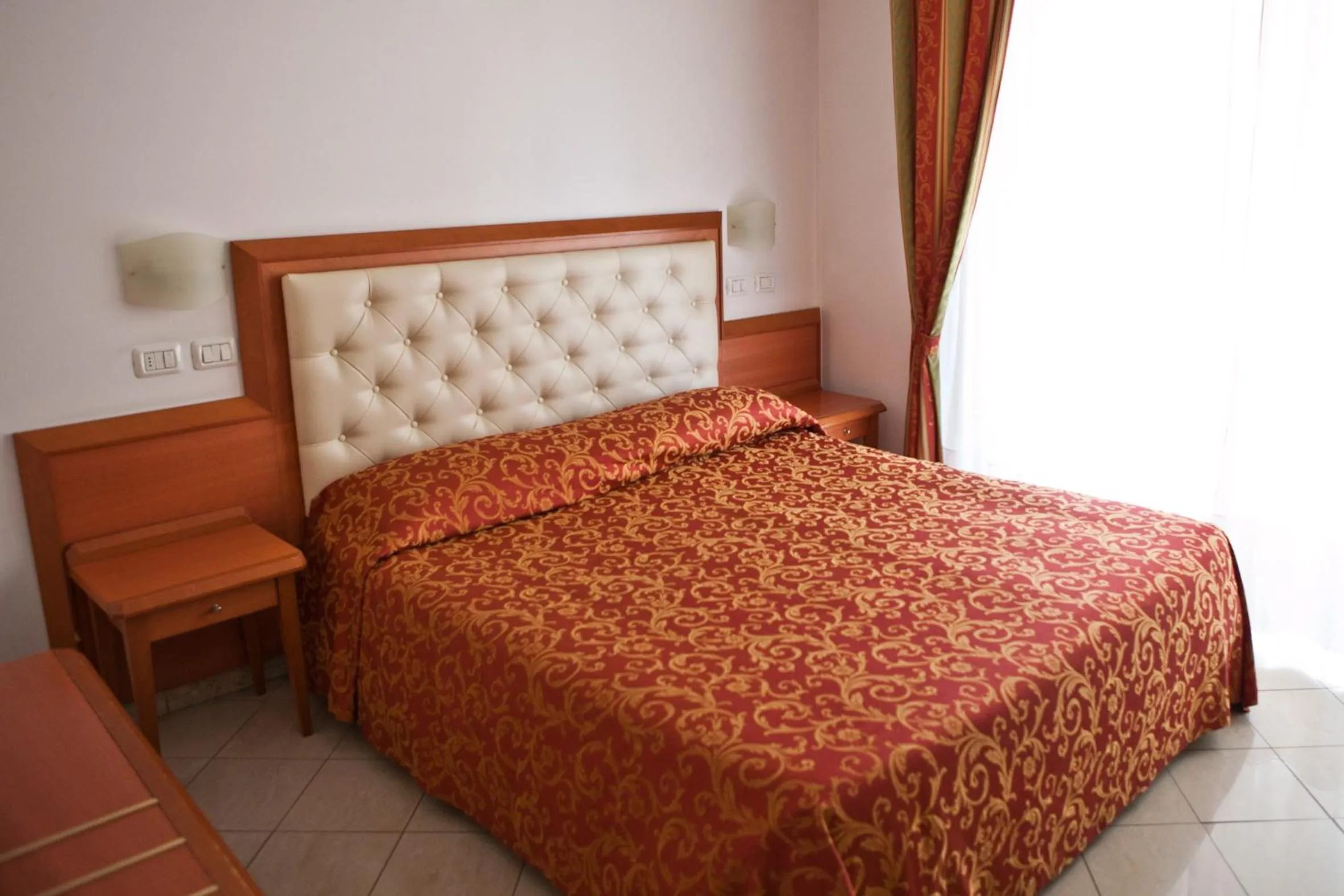 Bed in Hotel Gabbiano