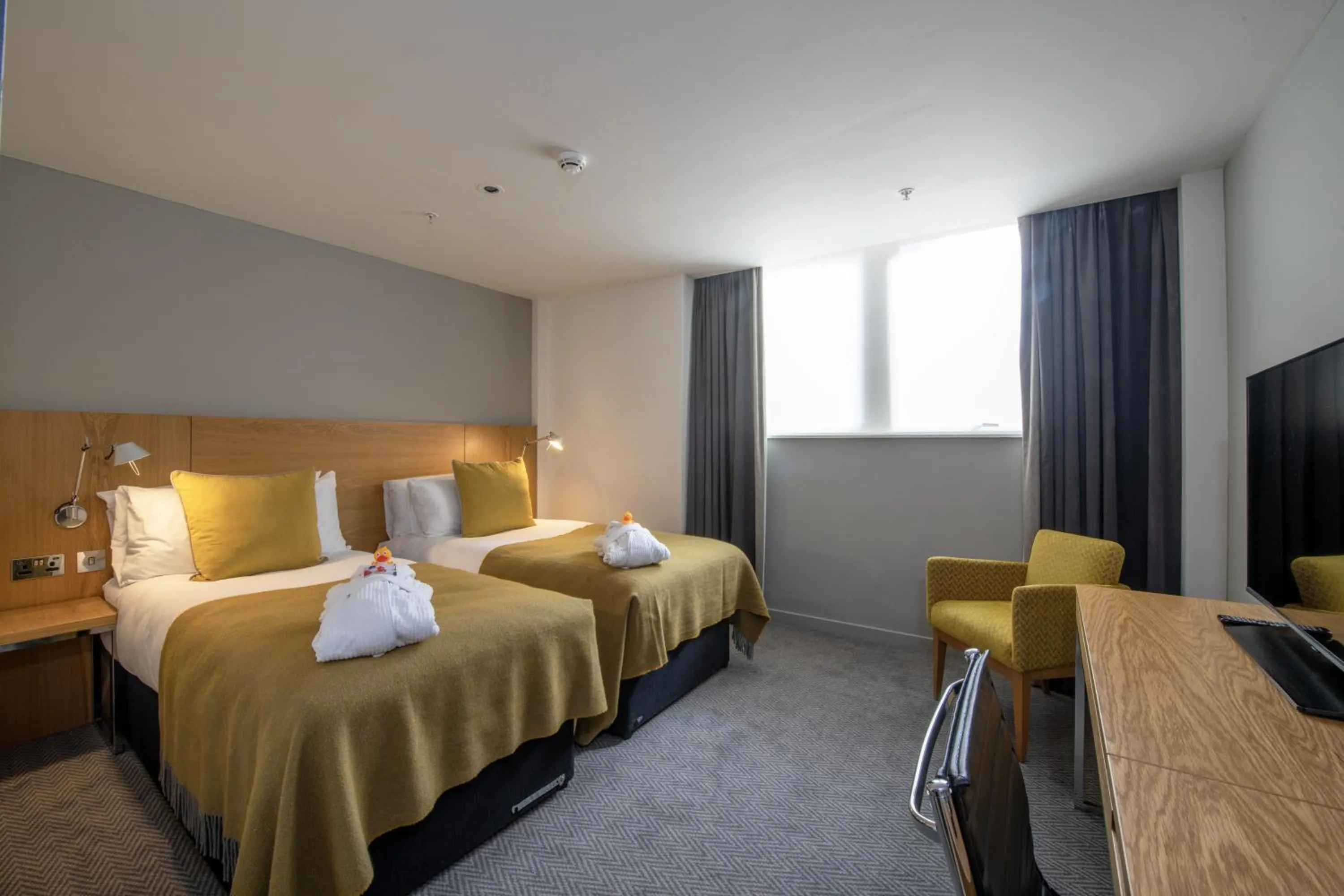 Bed in Apex City Of London Hotel