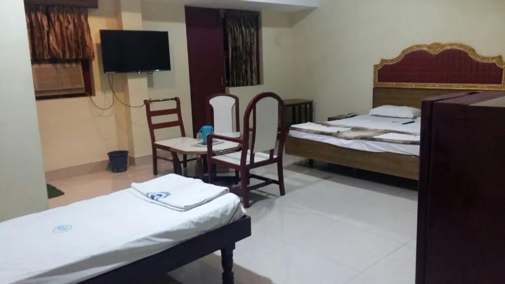 Living room, Bed in Hotel Chanma International