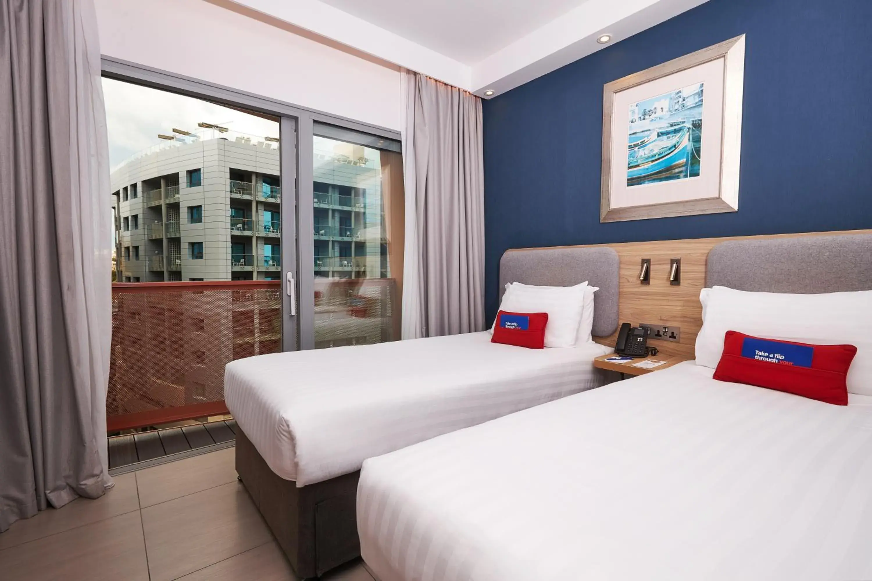 Standard Twin Room with Two Twin Beds and Balcony in Holiday Inn Express - Malta by IHG Standard Twin Room with Two Twin Beds and Balcony in Holiday Inn Express - Malta by IHG
