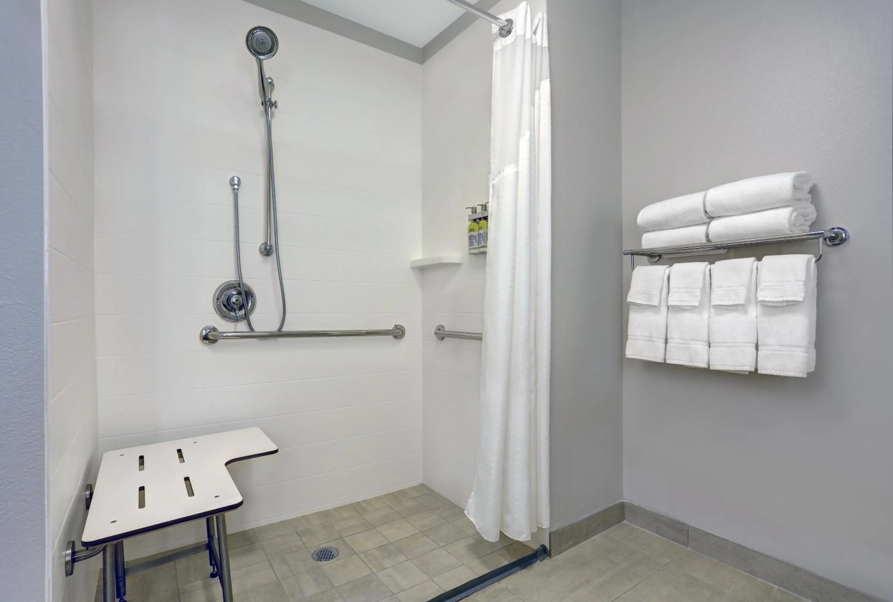 Bathroom in Holiday Inn Express & Suites - Lenexa - Overland Park Area by IHG