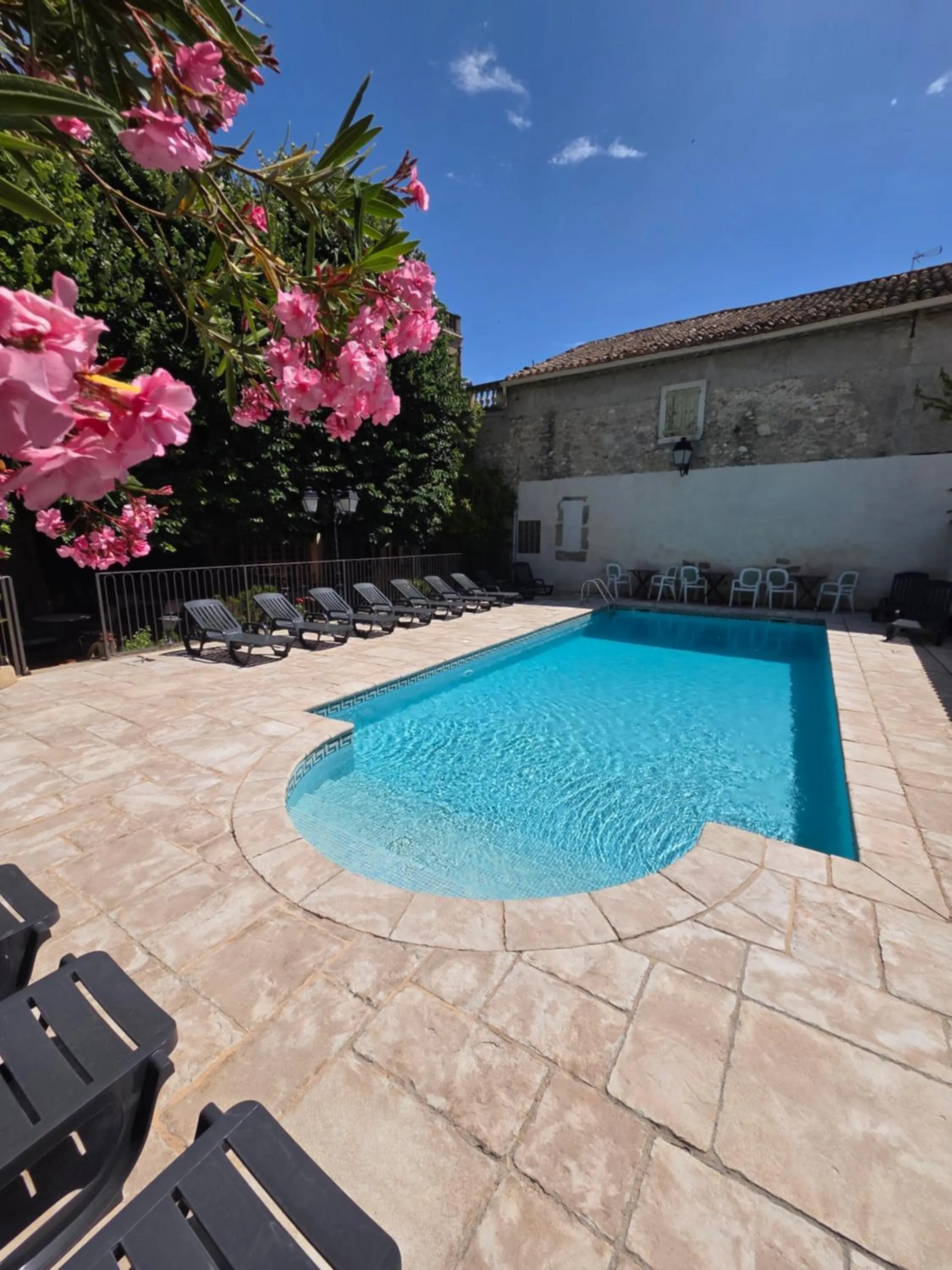 Pool view in Logis Hôtel Restaurant Résidence