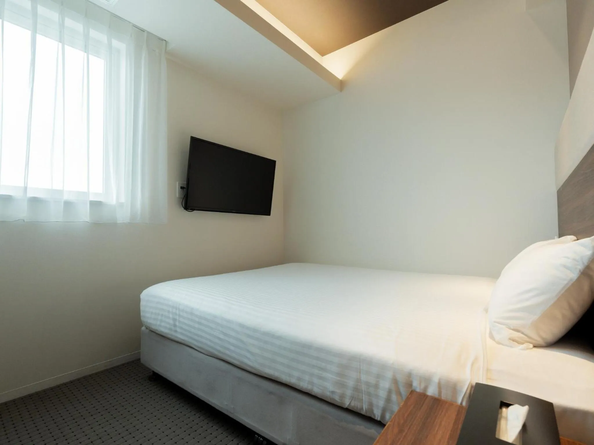 Bed in Hotel Aqua Citta Naha