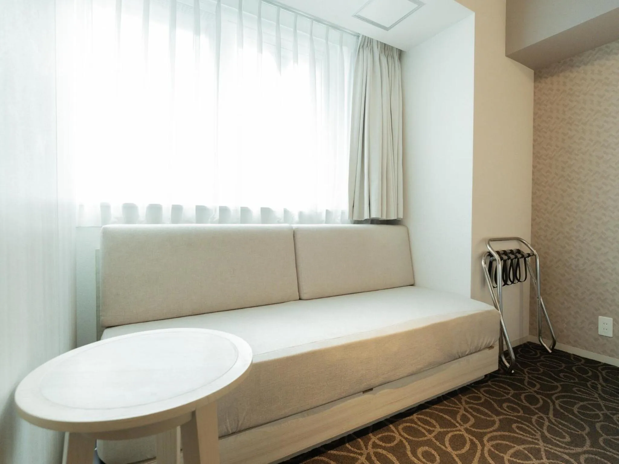 Photo of the whole room, Bed in Hotel Aqua Citta Naha