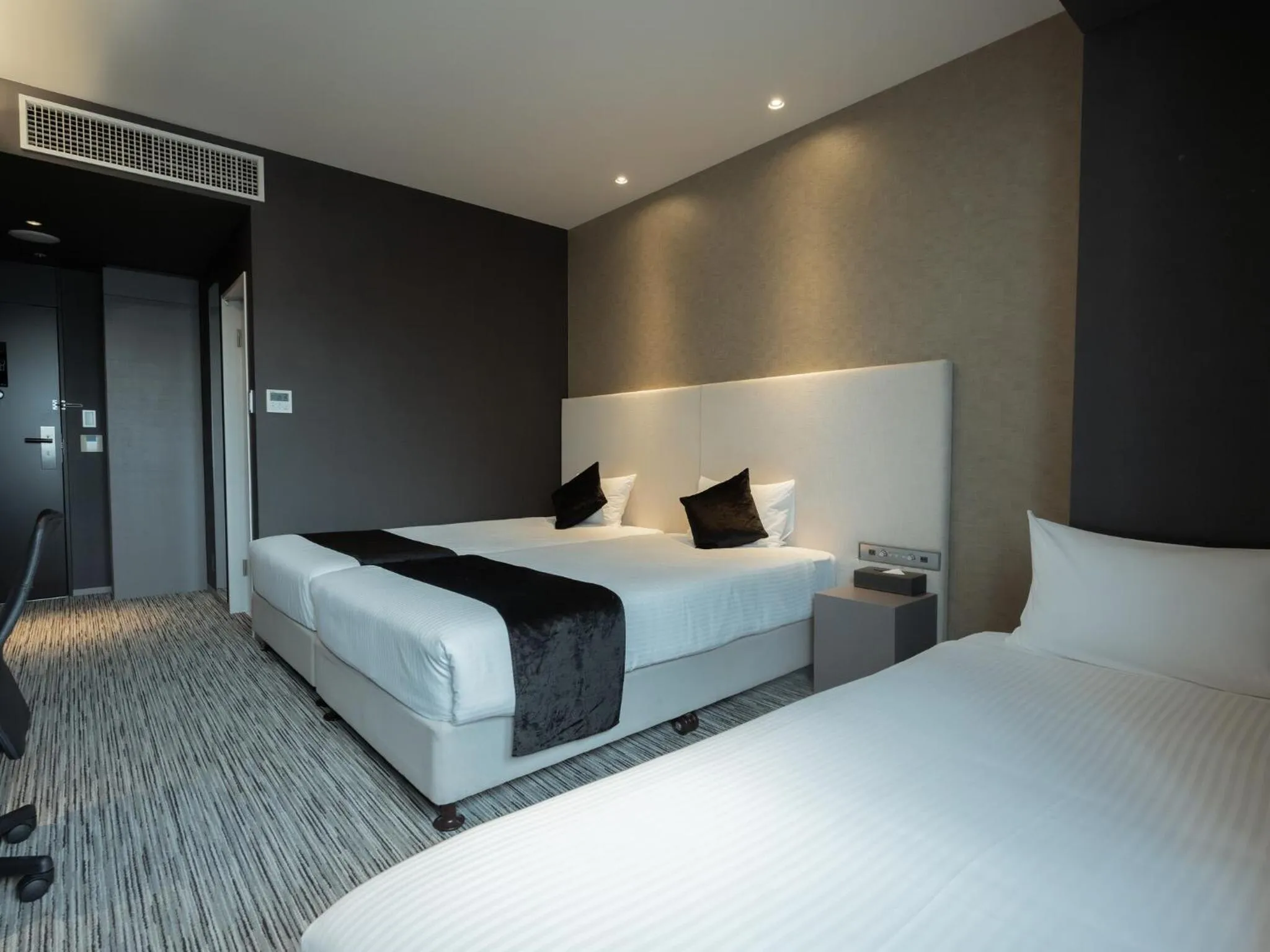 Bed in Hotel Aqua Citta Naha