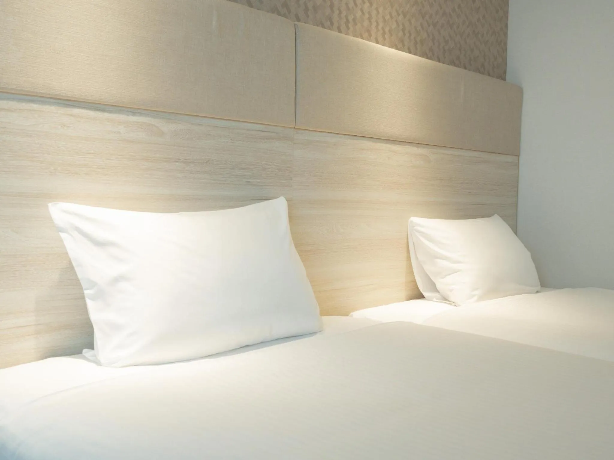 Bed in Hotel Aqua Citta Naha