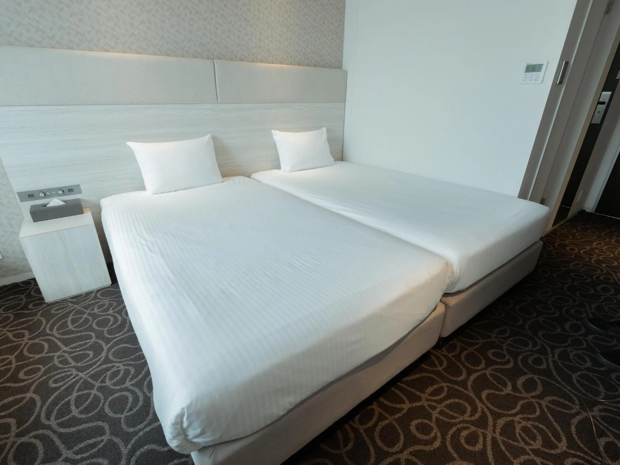 Bed in Hotel Aqua Citta Naha