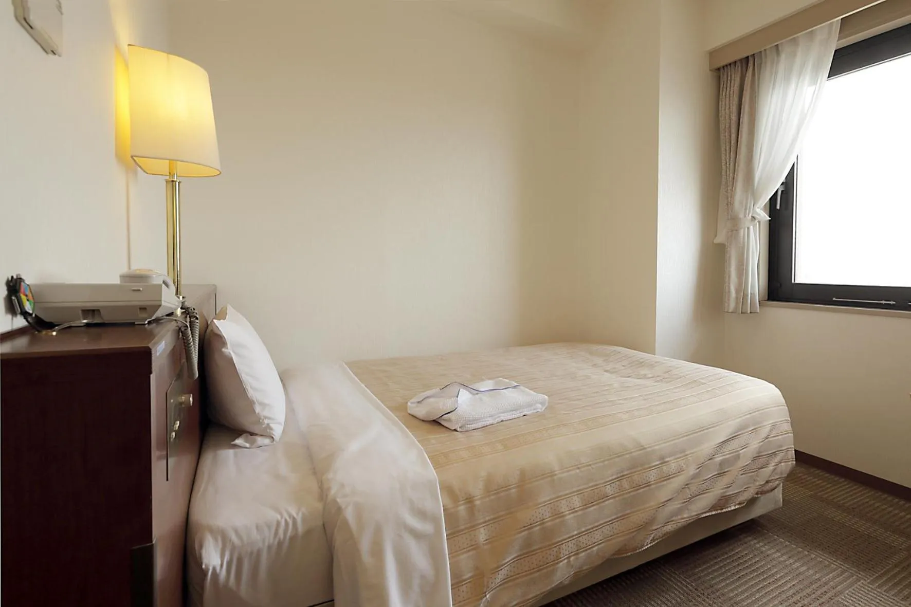 Photo of the whole room, Bed in Kumegawa Wing Hotel