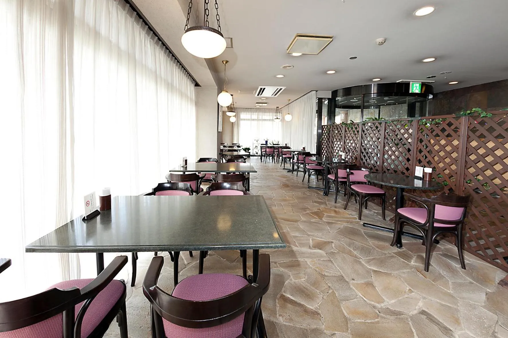 Communal lounge/ TV room in Kumegawa Wing Hotel