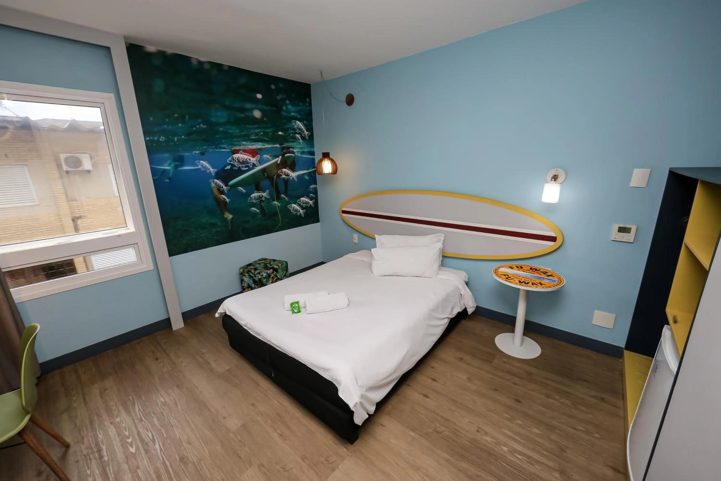 Bedroom, Bed in Delphin Surf Hotel
