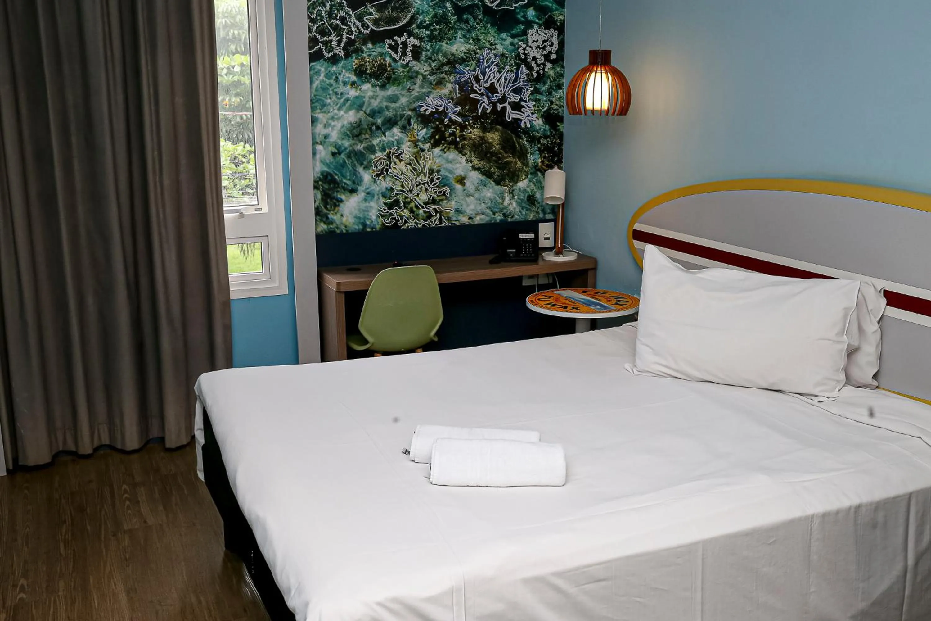 Bedroom, Bed in Delphin Surf Hotel