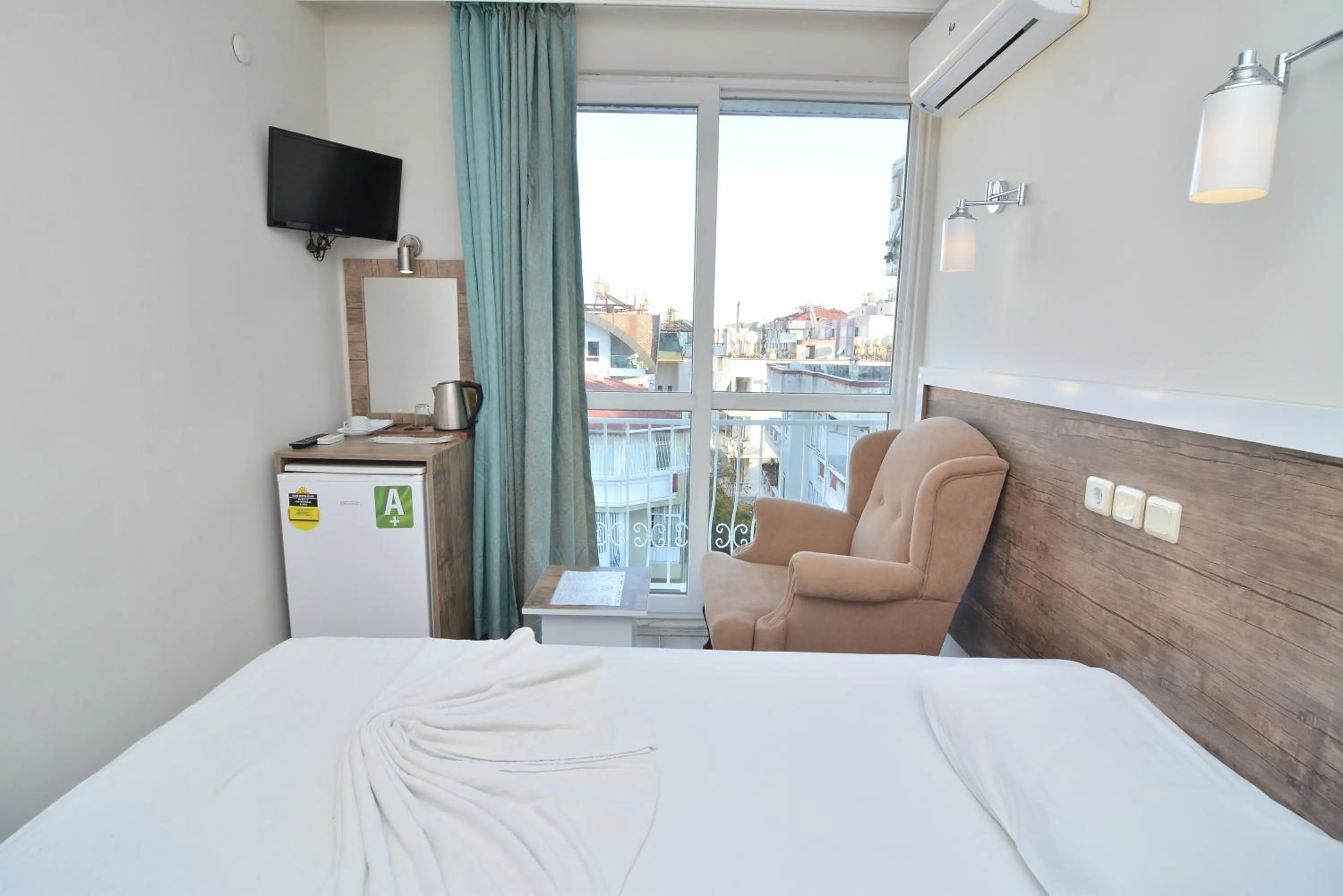 Communal lounge/ TV room, Bed in Cleopatra King Apart