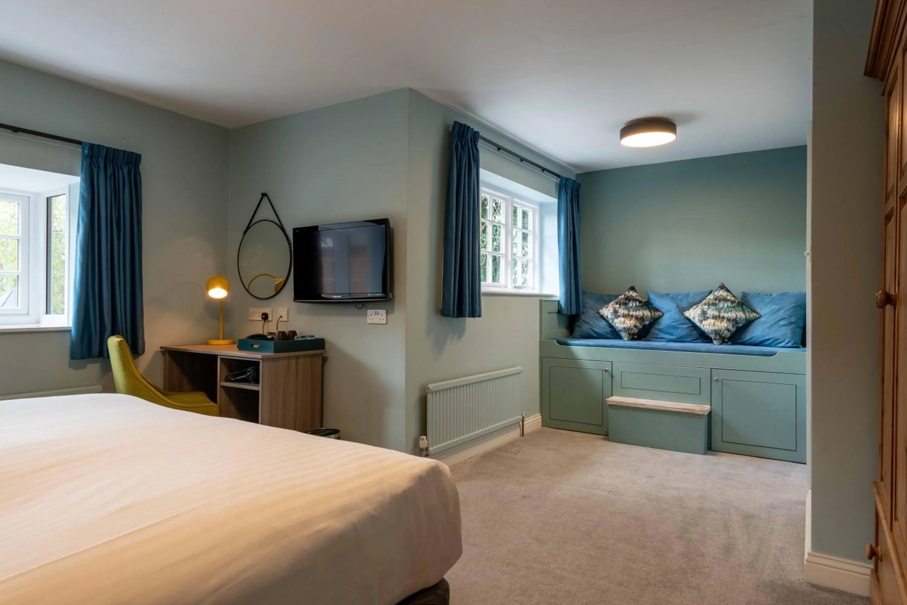 Bed in Wisteria Hotel