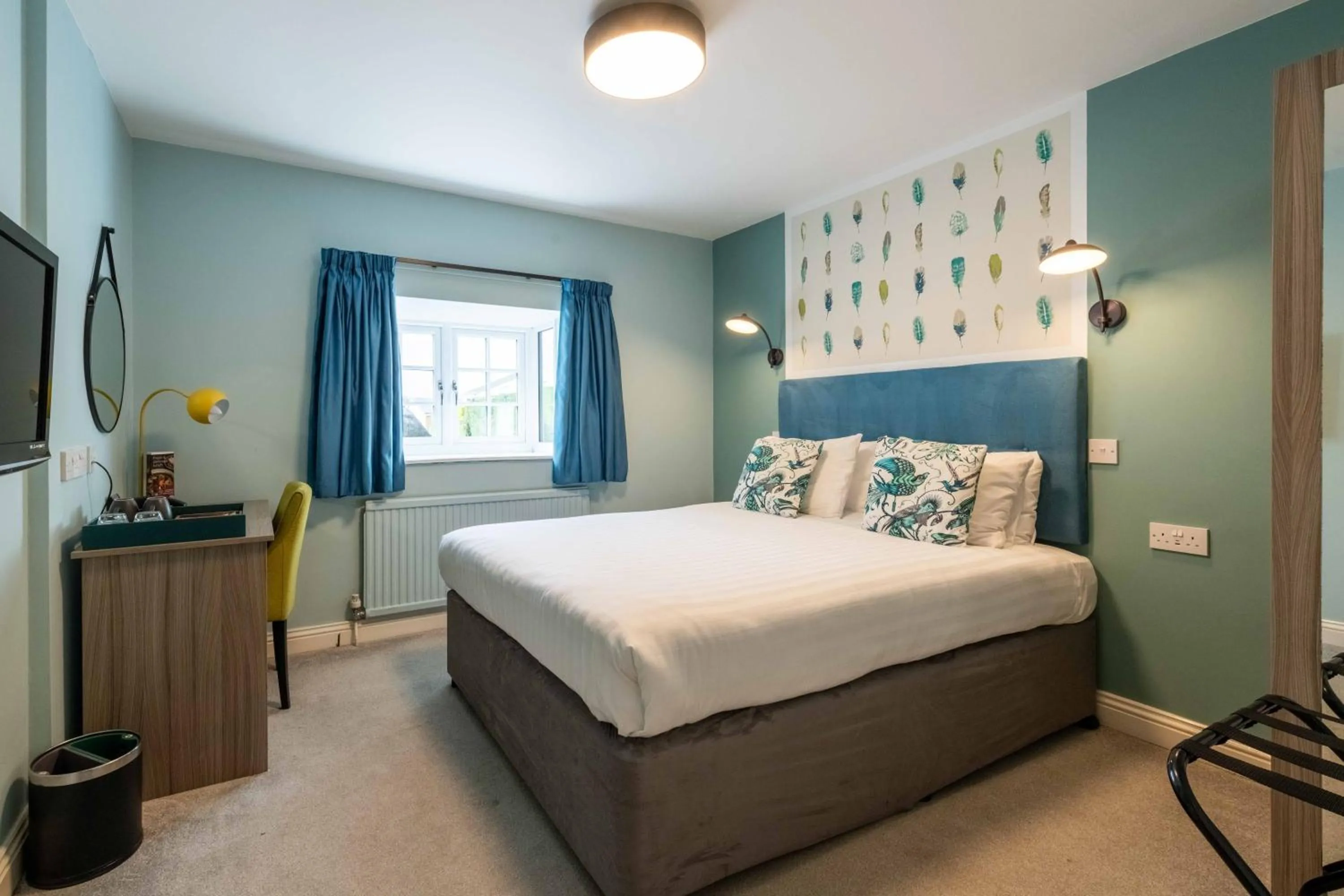 Bed in Wisteria Hotel