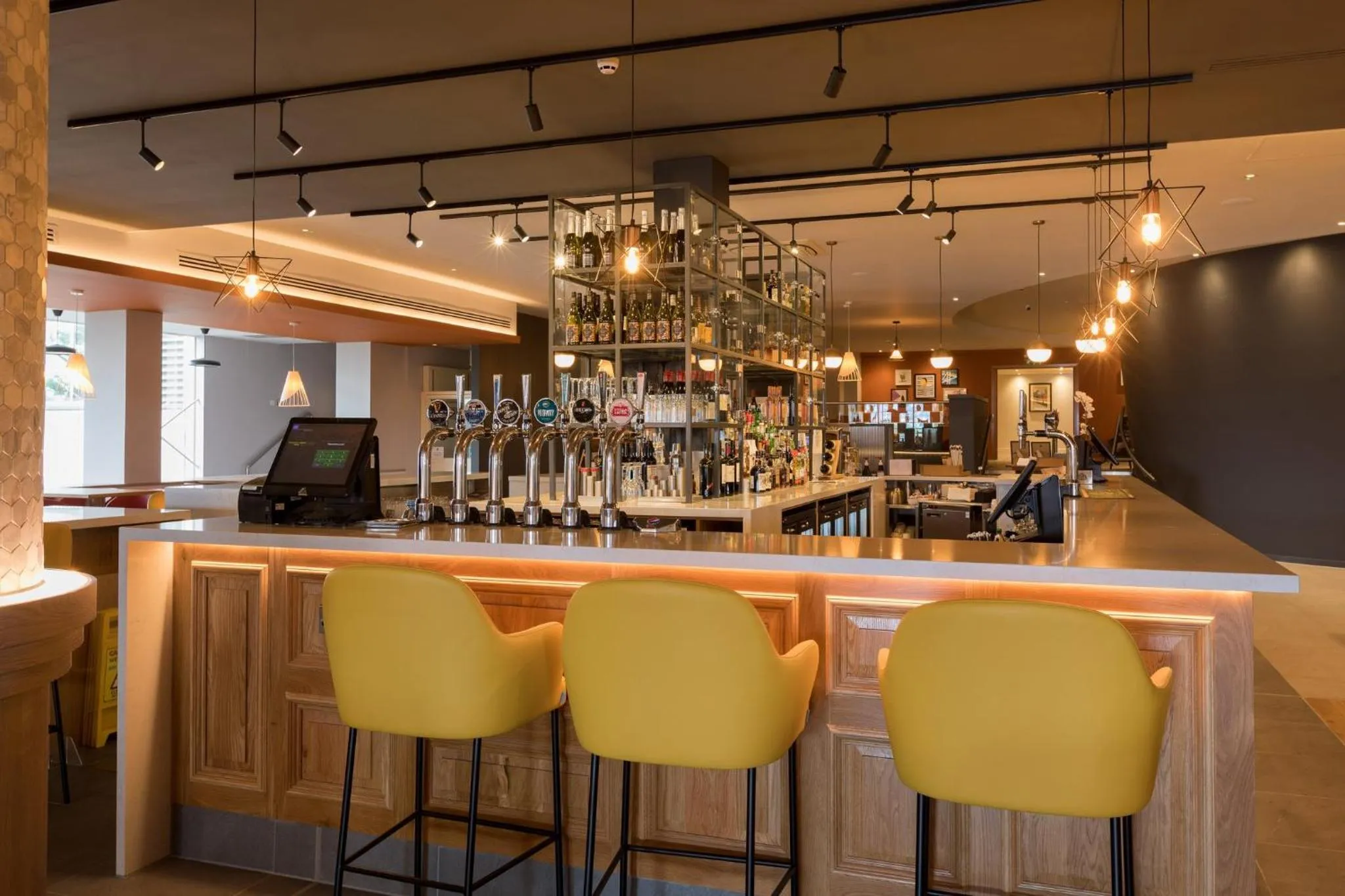 Lounge or bar in Holiday Inn Edinburgh Zoo by IHG