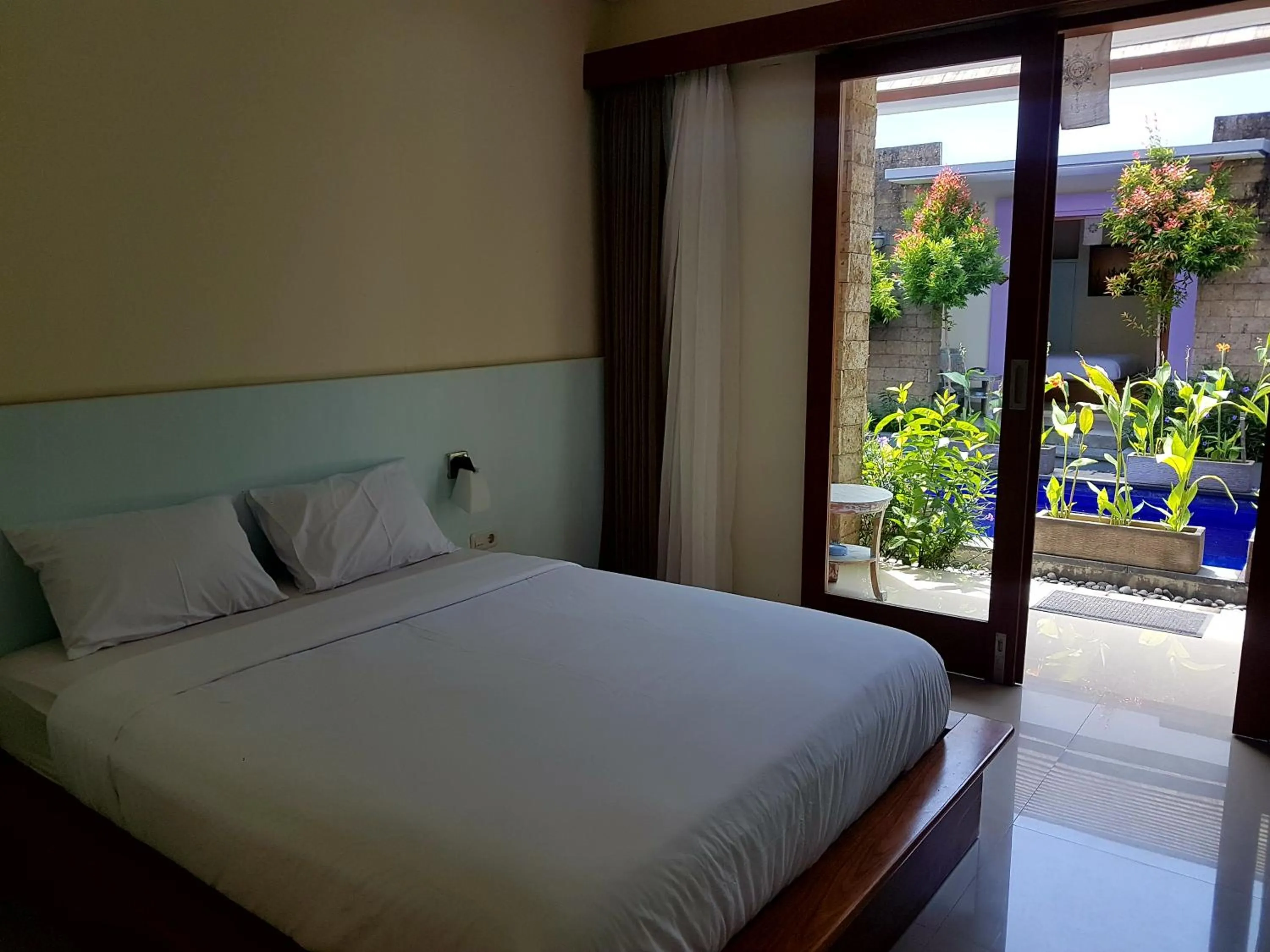 Bed in Ayu Love & Harmony Guest House
