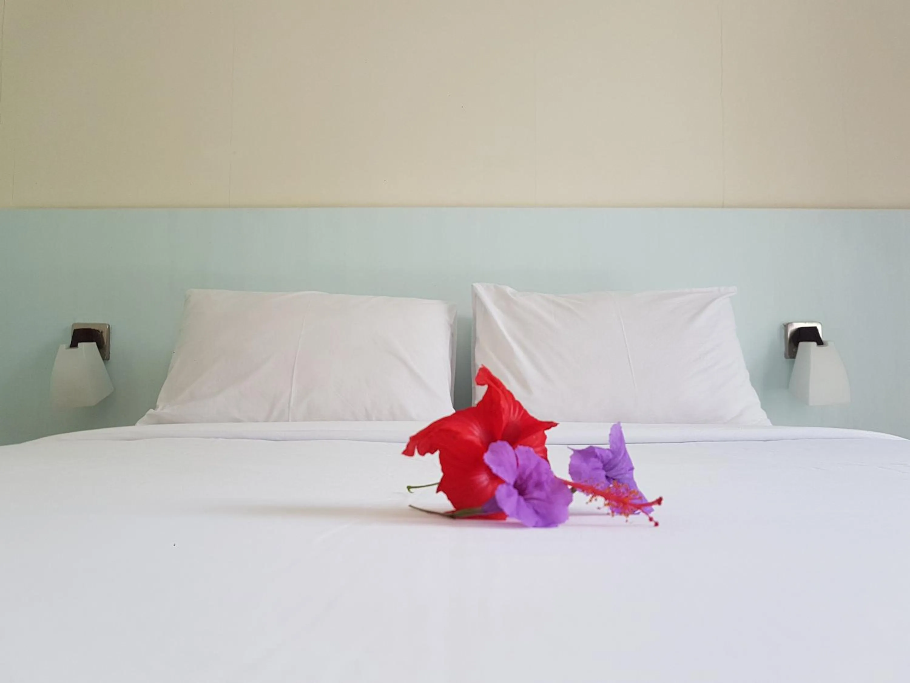 Bed in Ayu Love & Harmony Guest House