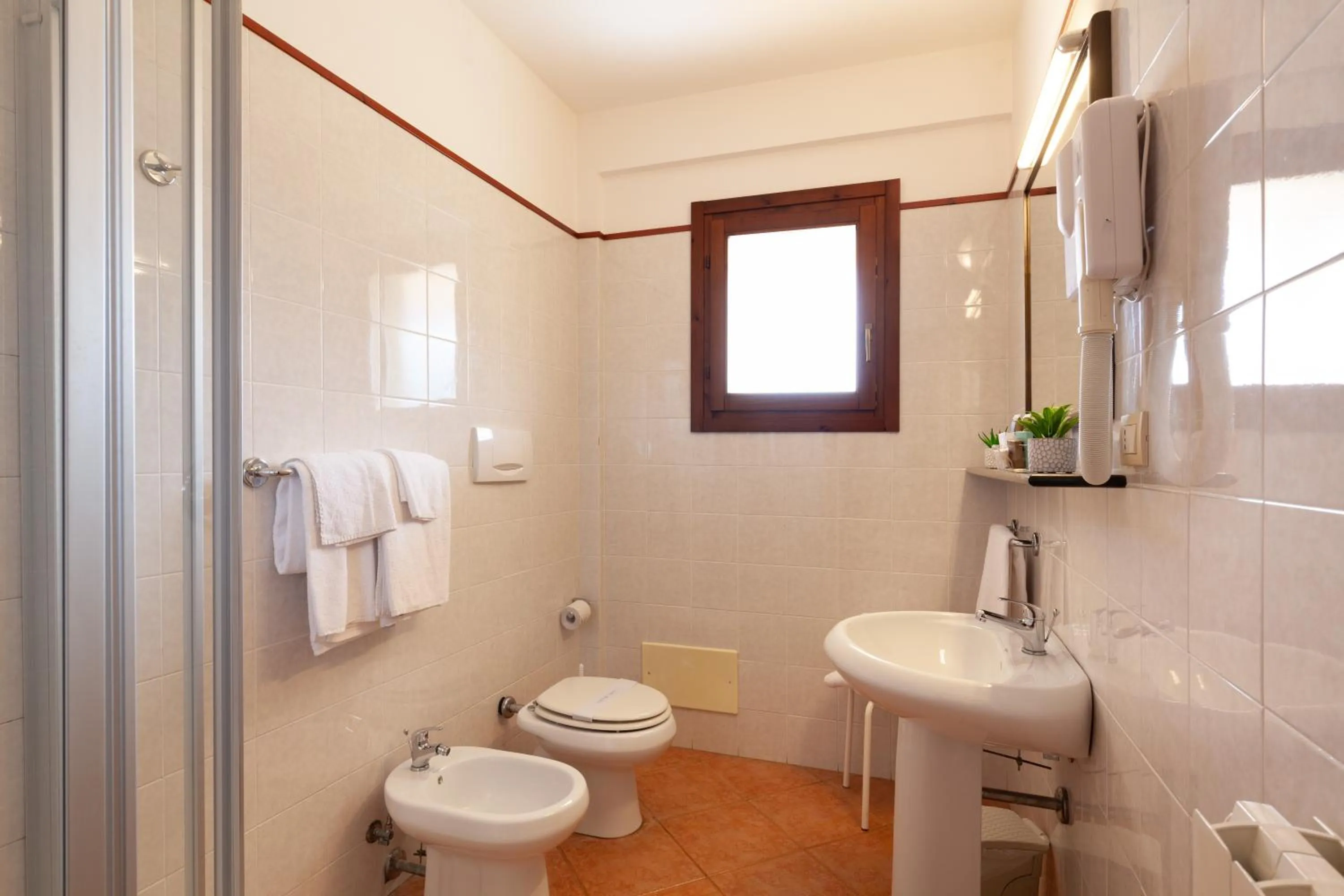 Bathroom in iH Hotels Le Zagare Resort