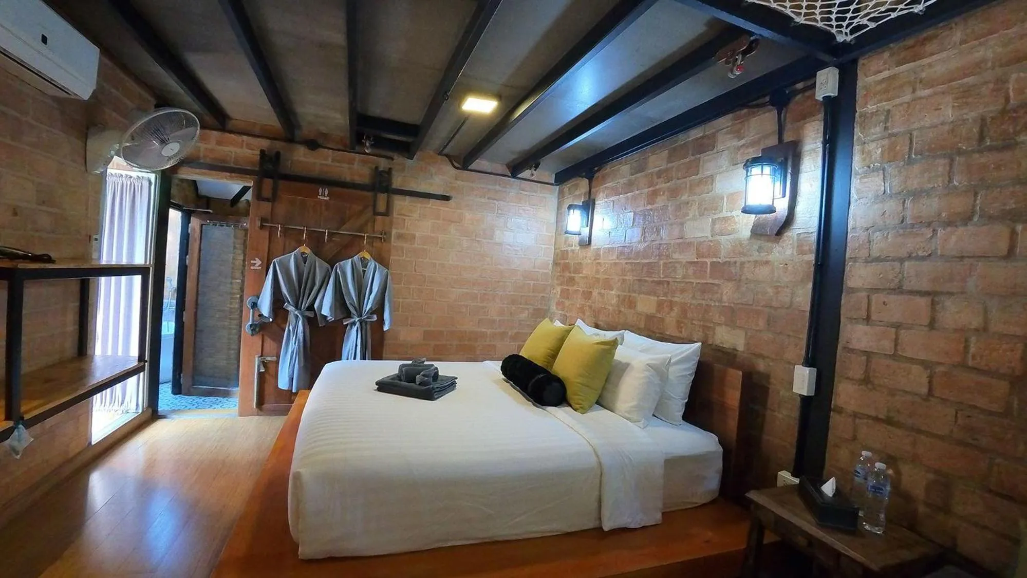 Bed in Tolani Riverside Villa