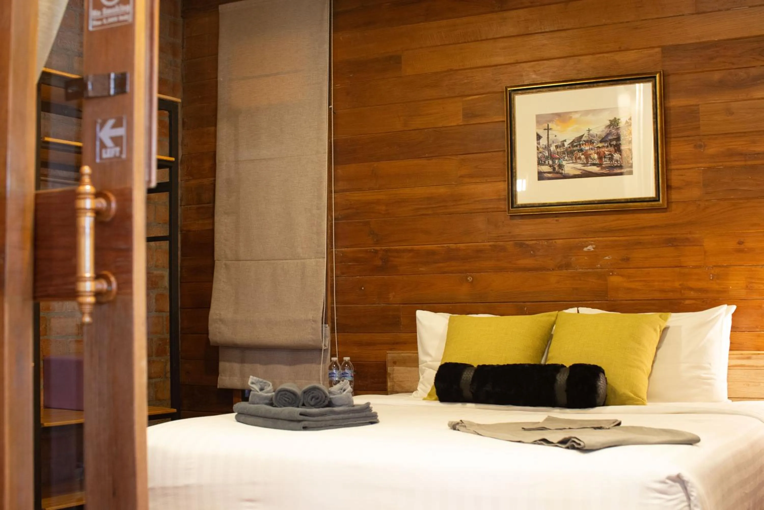 Bed in Tolani Riverside Villa