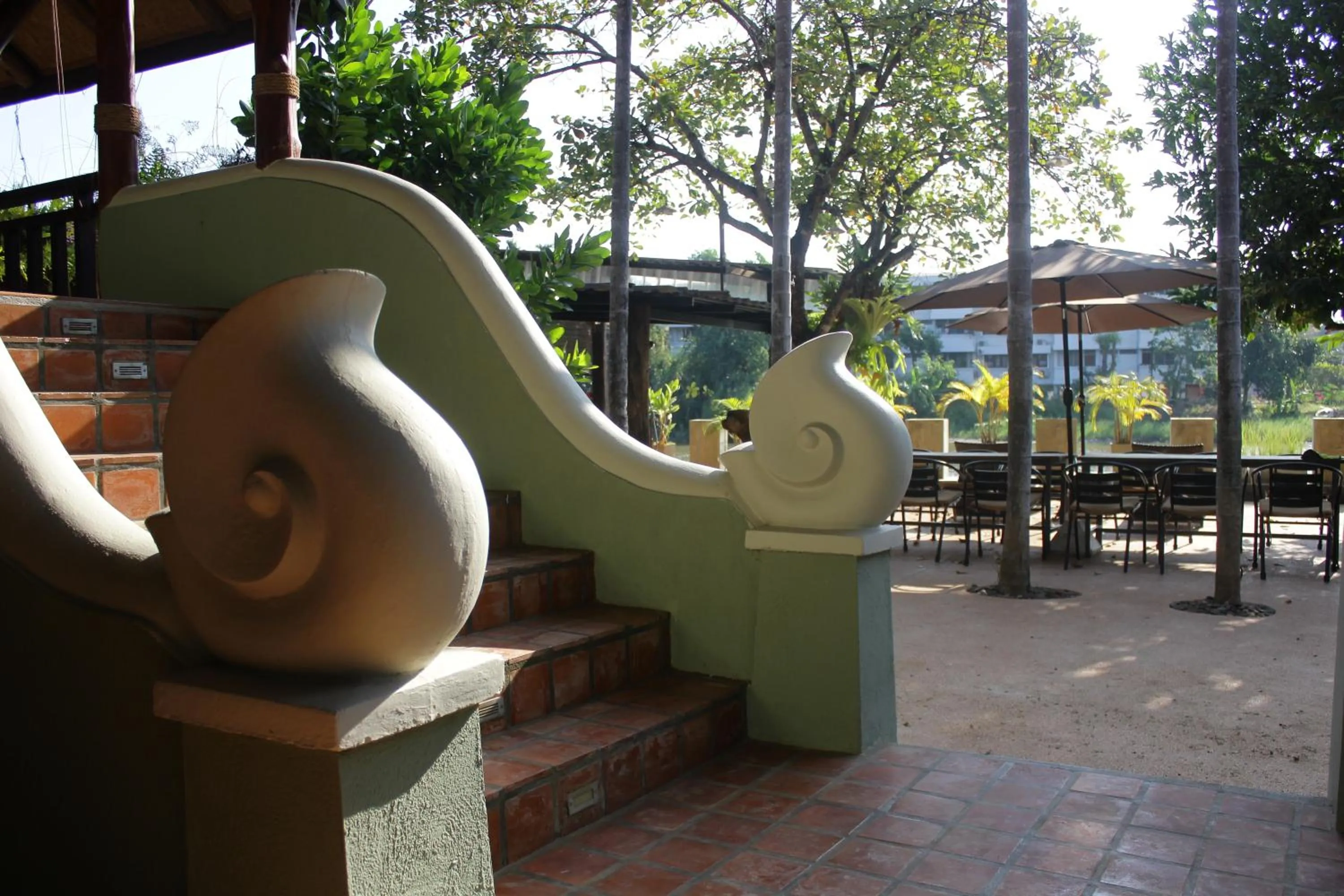 Patio in Tolani Riverside Villa