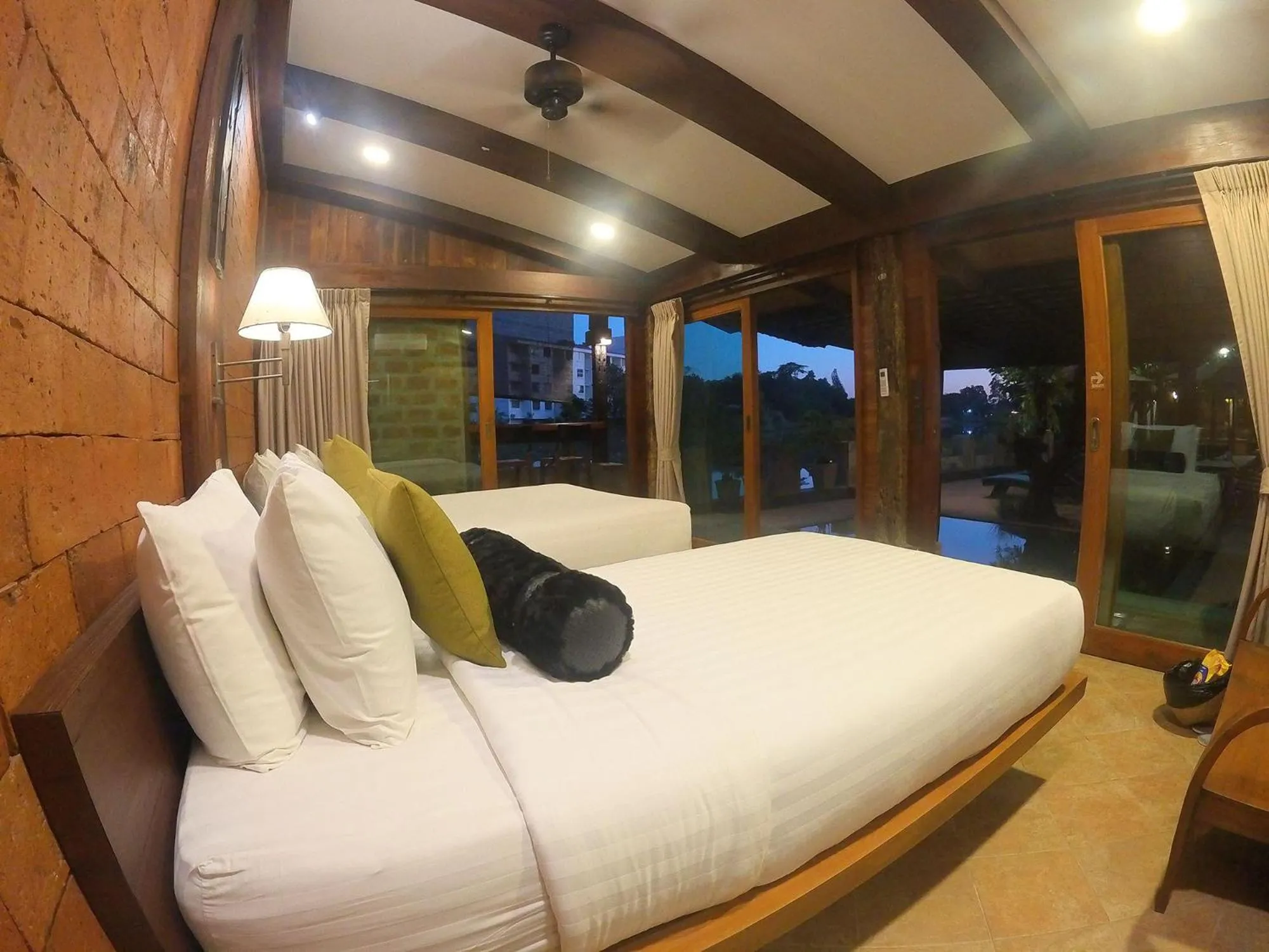 Bed in Tolani Riverside Villa