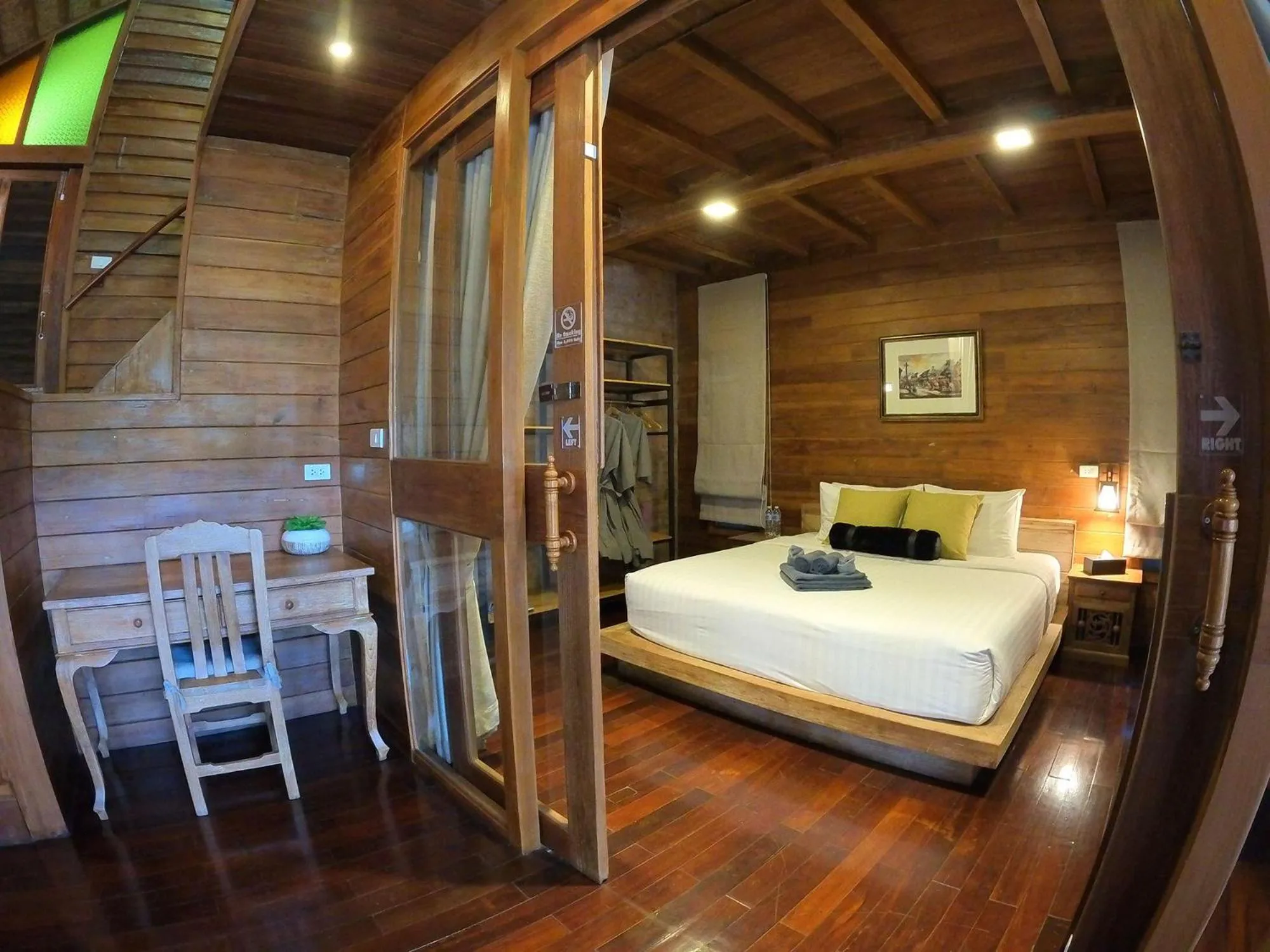 Bed in Tolani Riverside Villa