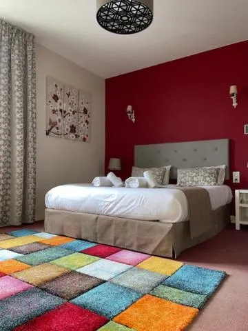 Photo of the whole room, Bed in Hôtel de la Côte Fleurie