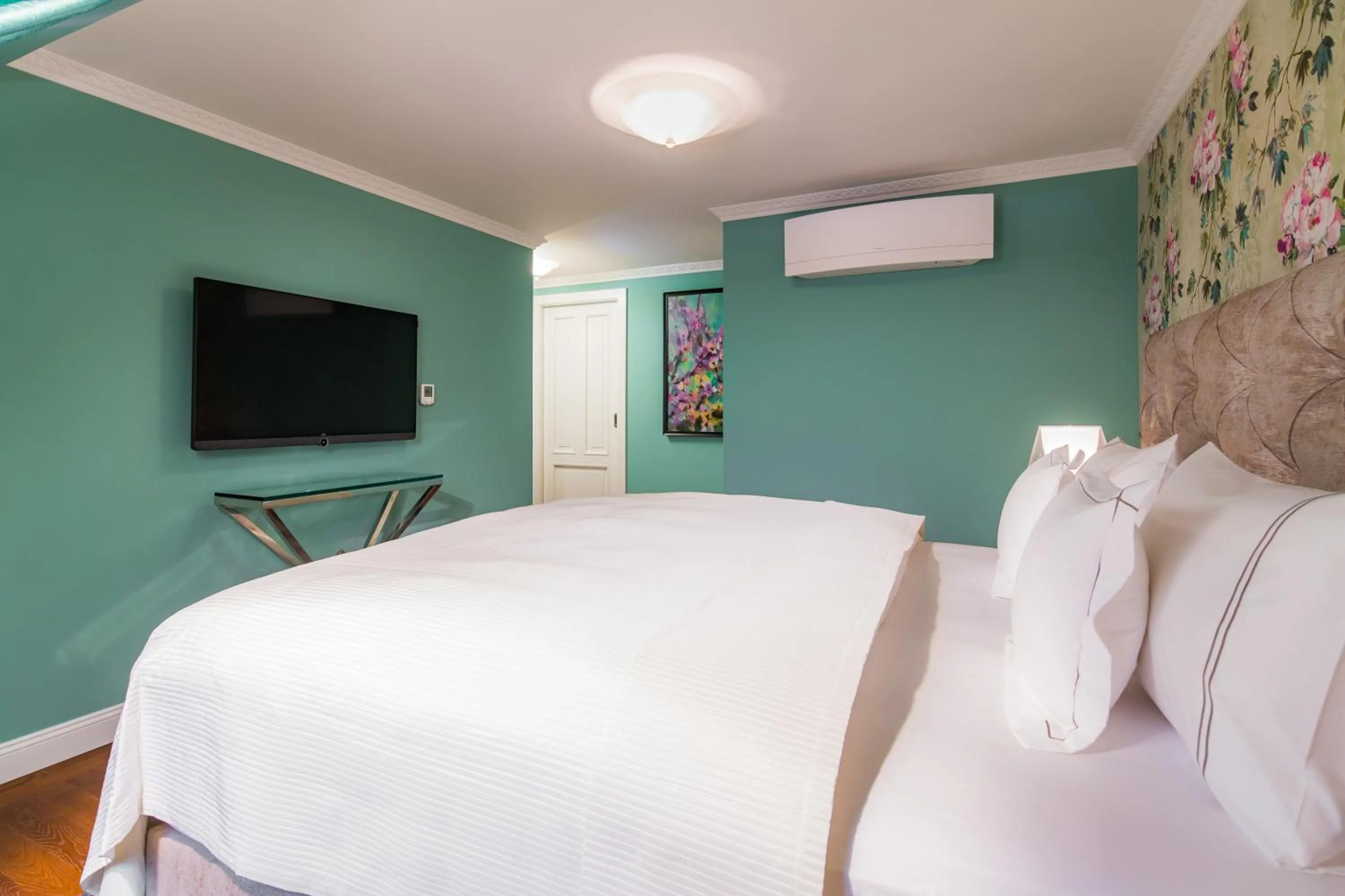 Bed in Rubin Luxury Apartments