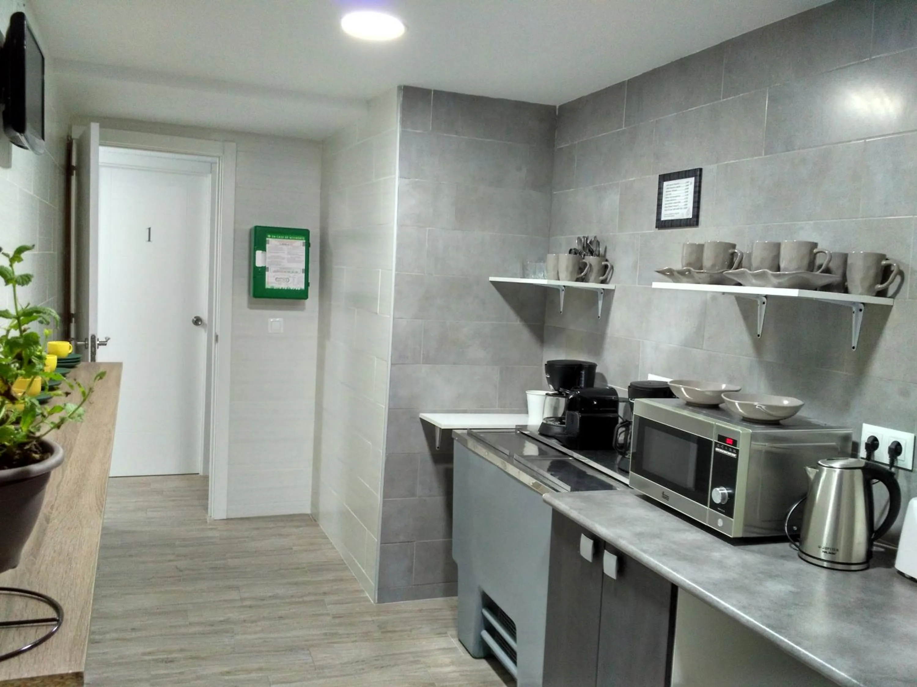 Kitchen or kitchenette in Guesthouse Central