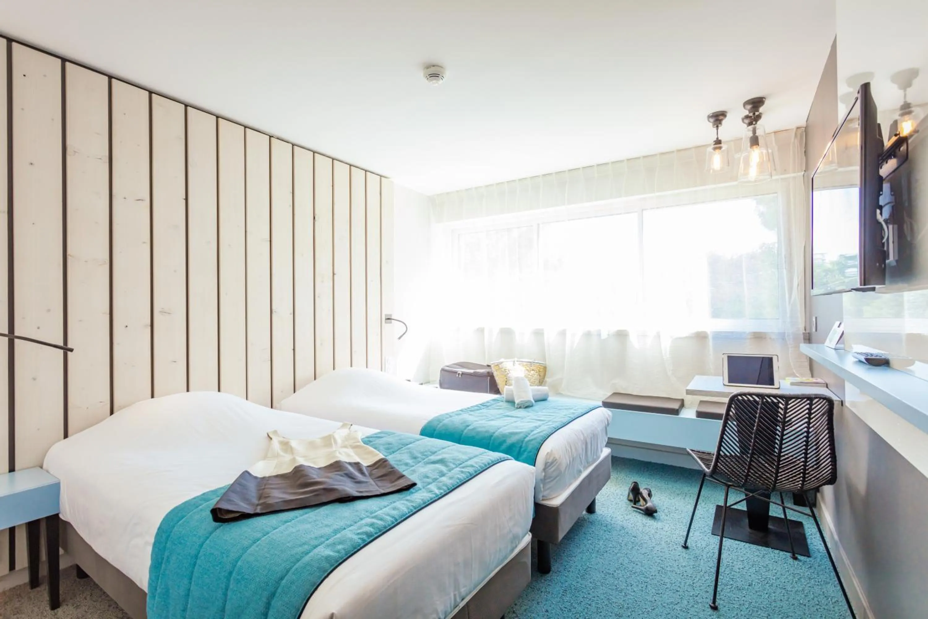 Photo of the whole room, Bed in Logis Hôtel Les Pins - Opéralia