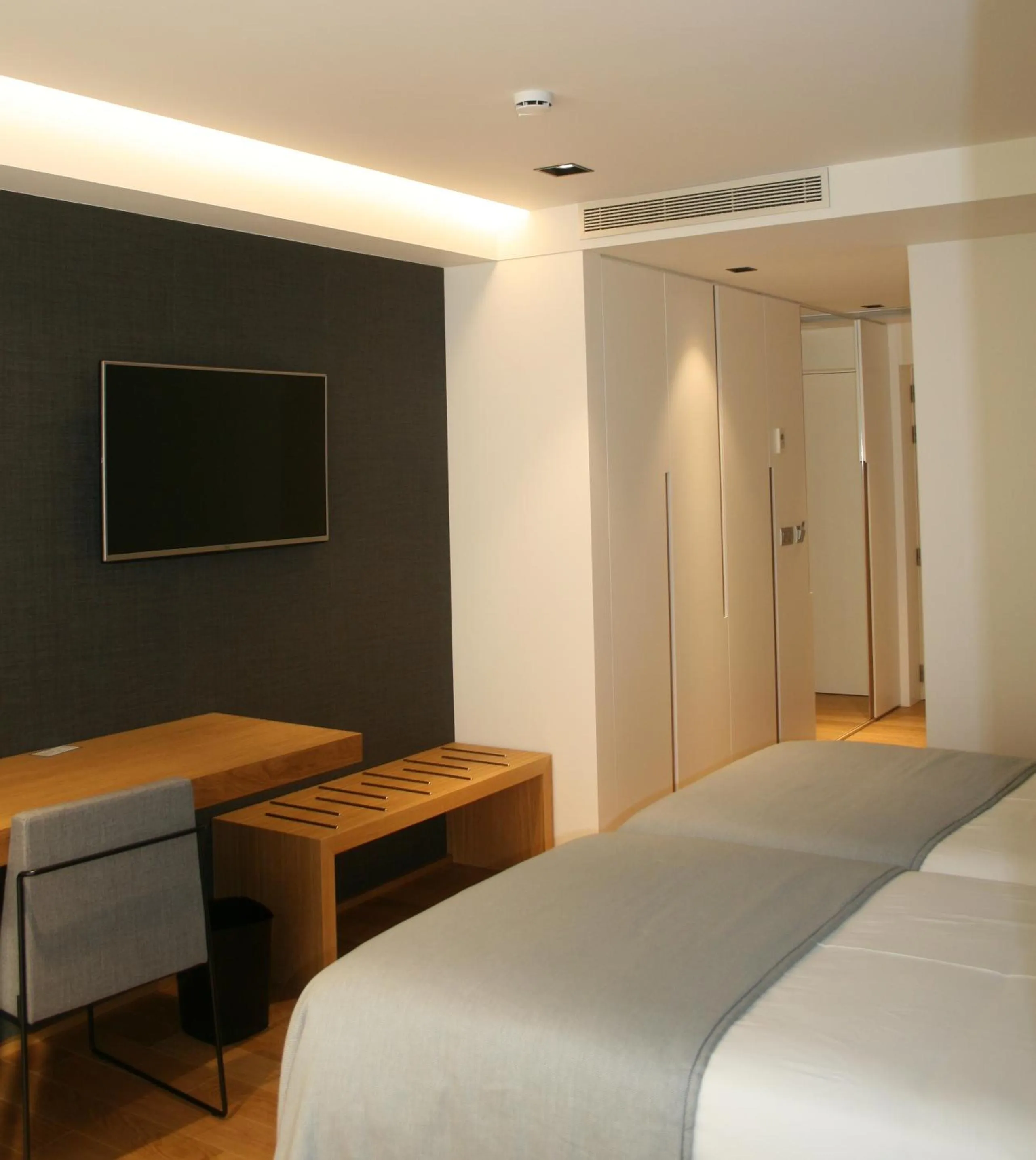 Bed in Hotel U Viveiro