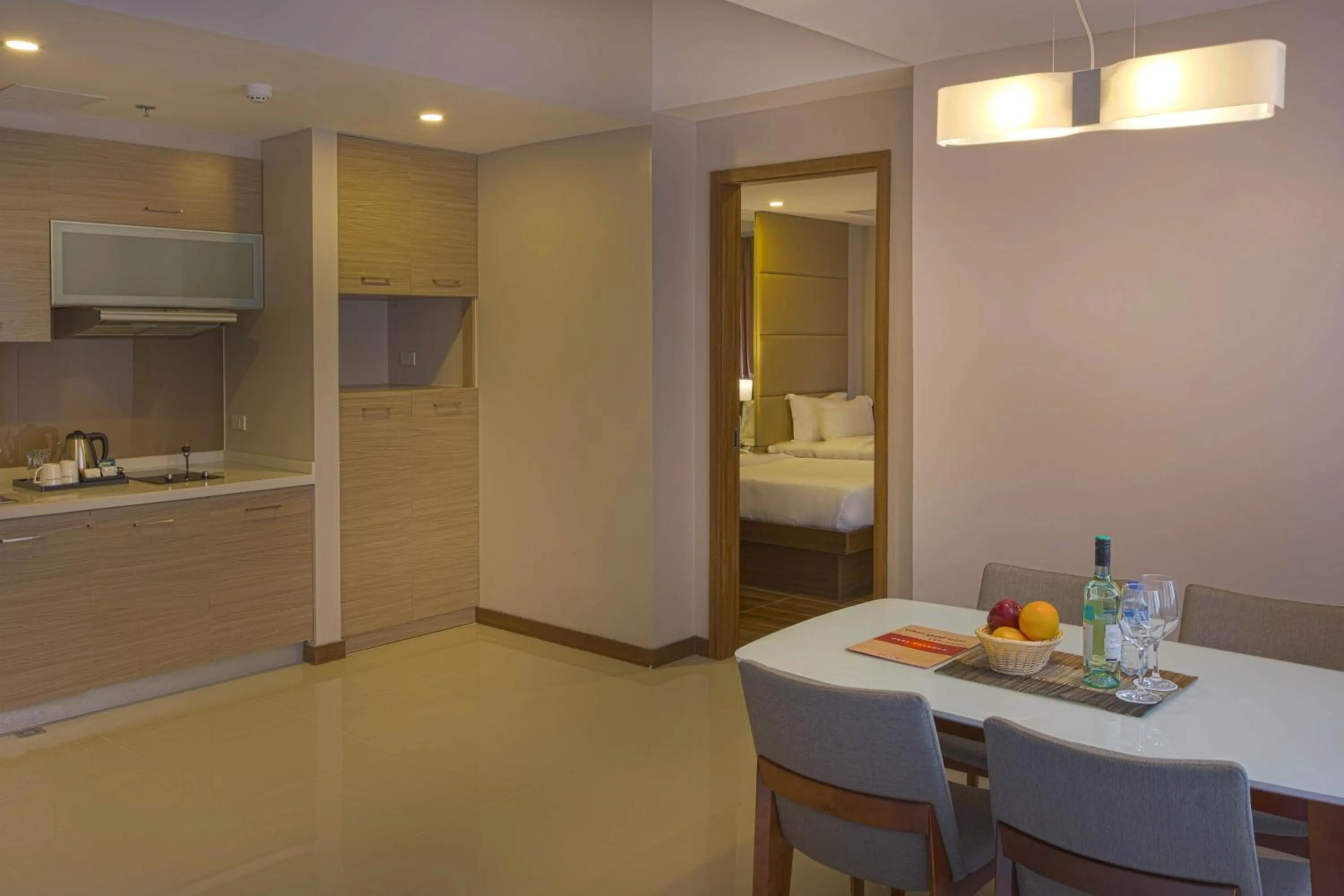 Kitchen or kitchenette in Valero Grand Suites by Swiss-Belhotel