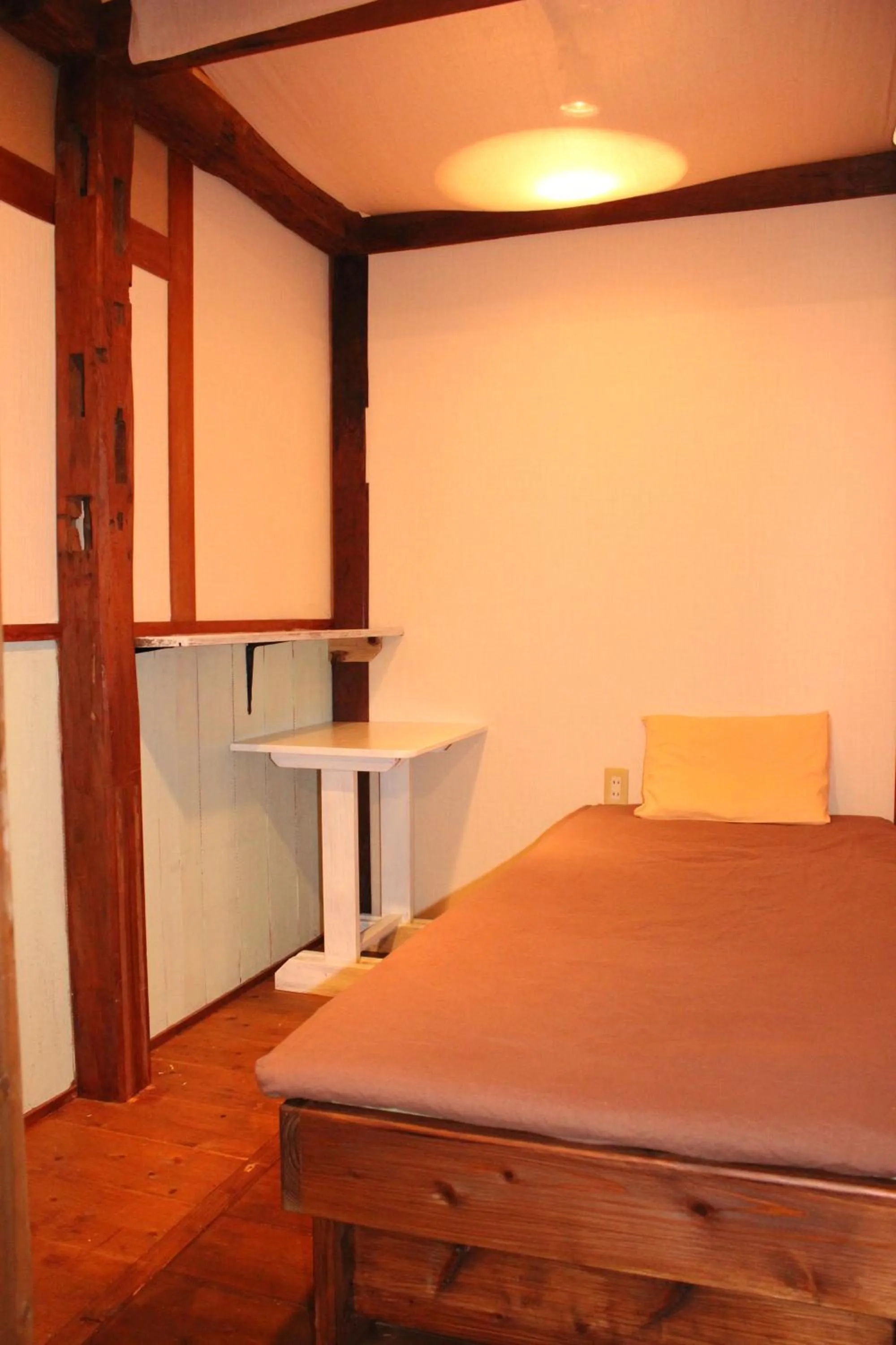 Bed in guest house Holoholo Ishigakijima