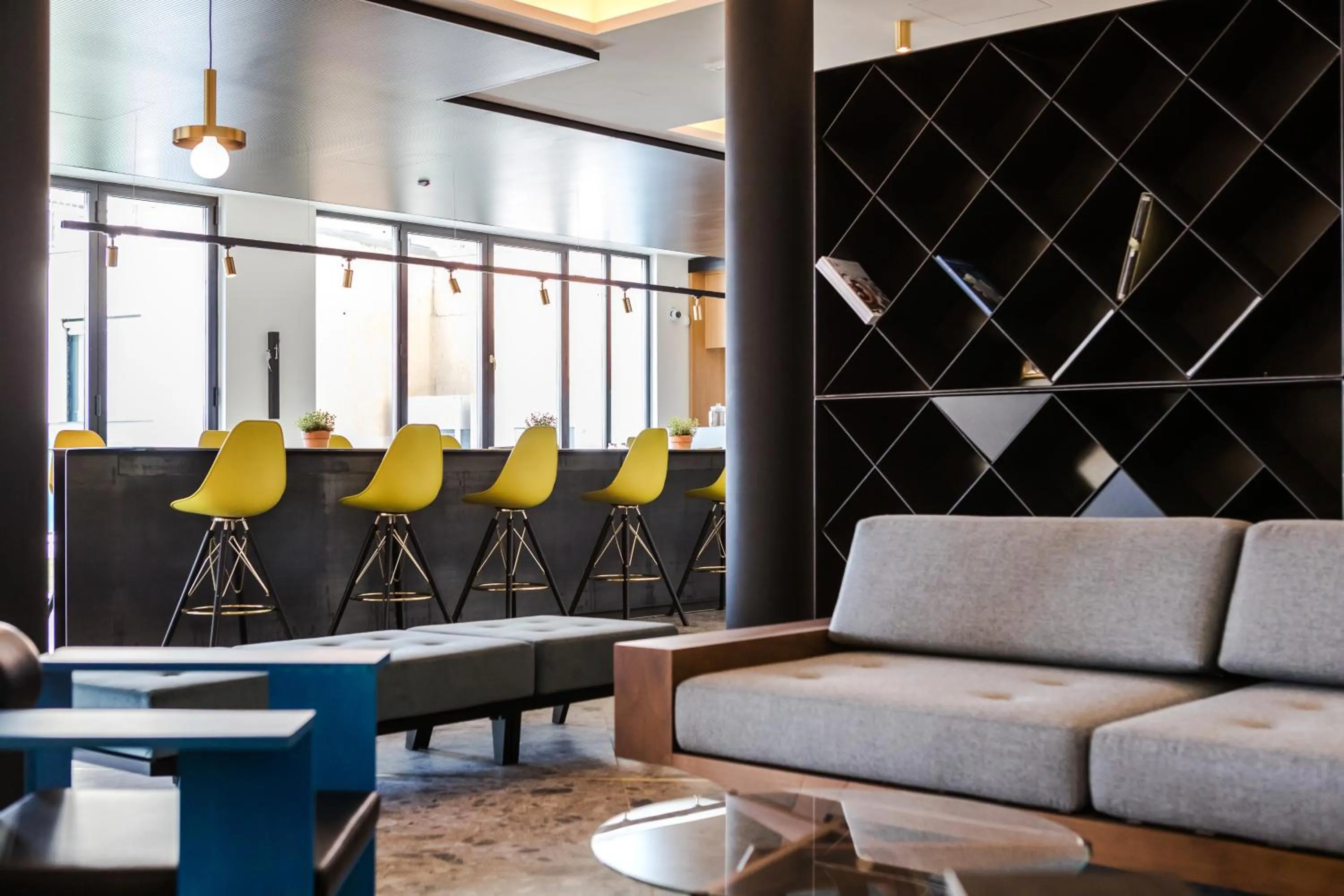 Communal lounge/ TV room in MaisonMe Boutique Hotel