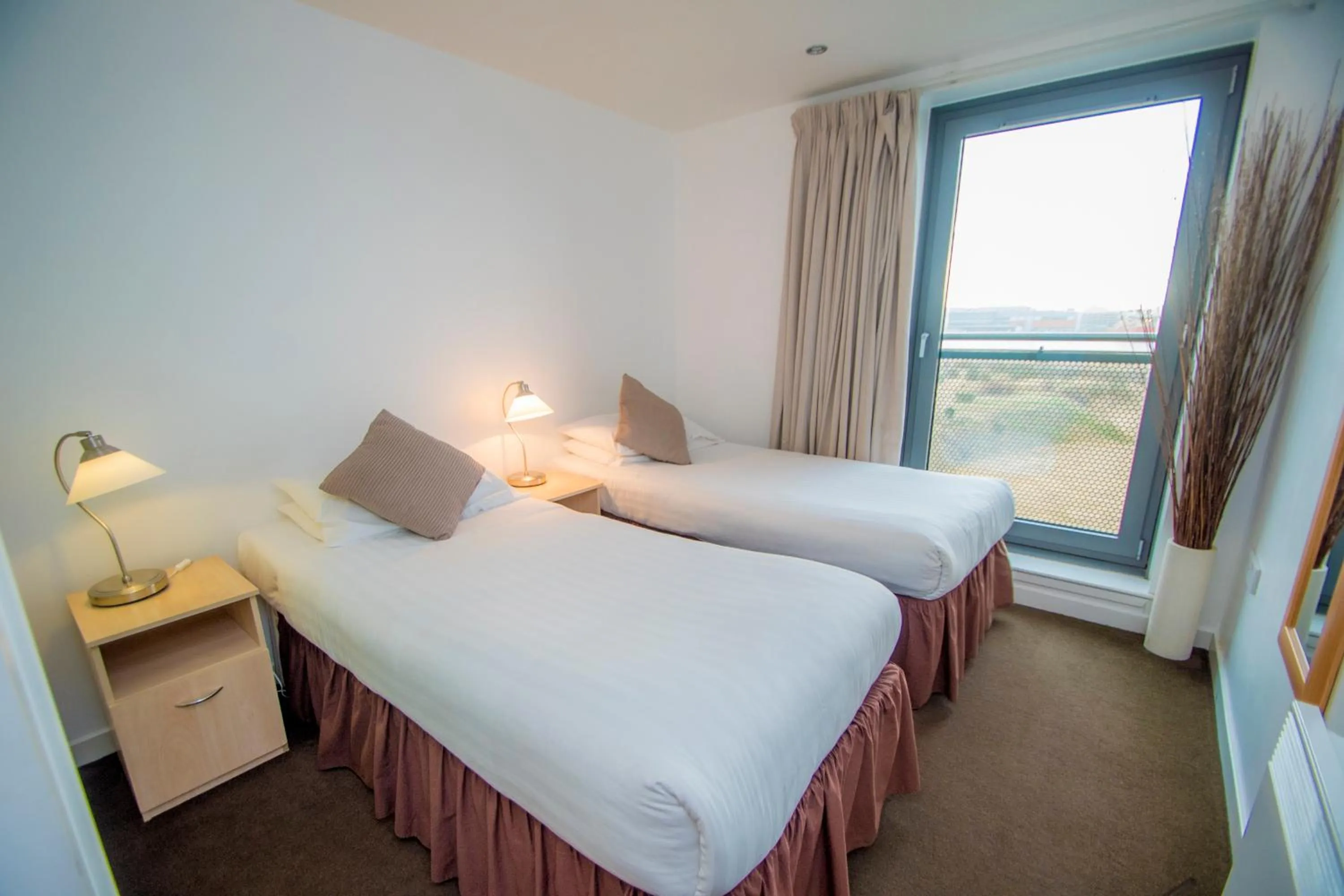 Bedroom, Bed in Ocean Serviced Apartments