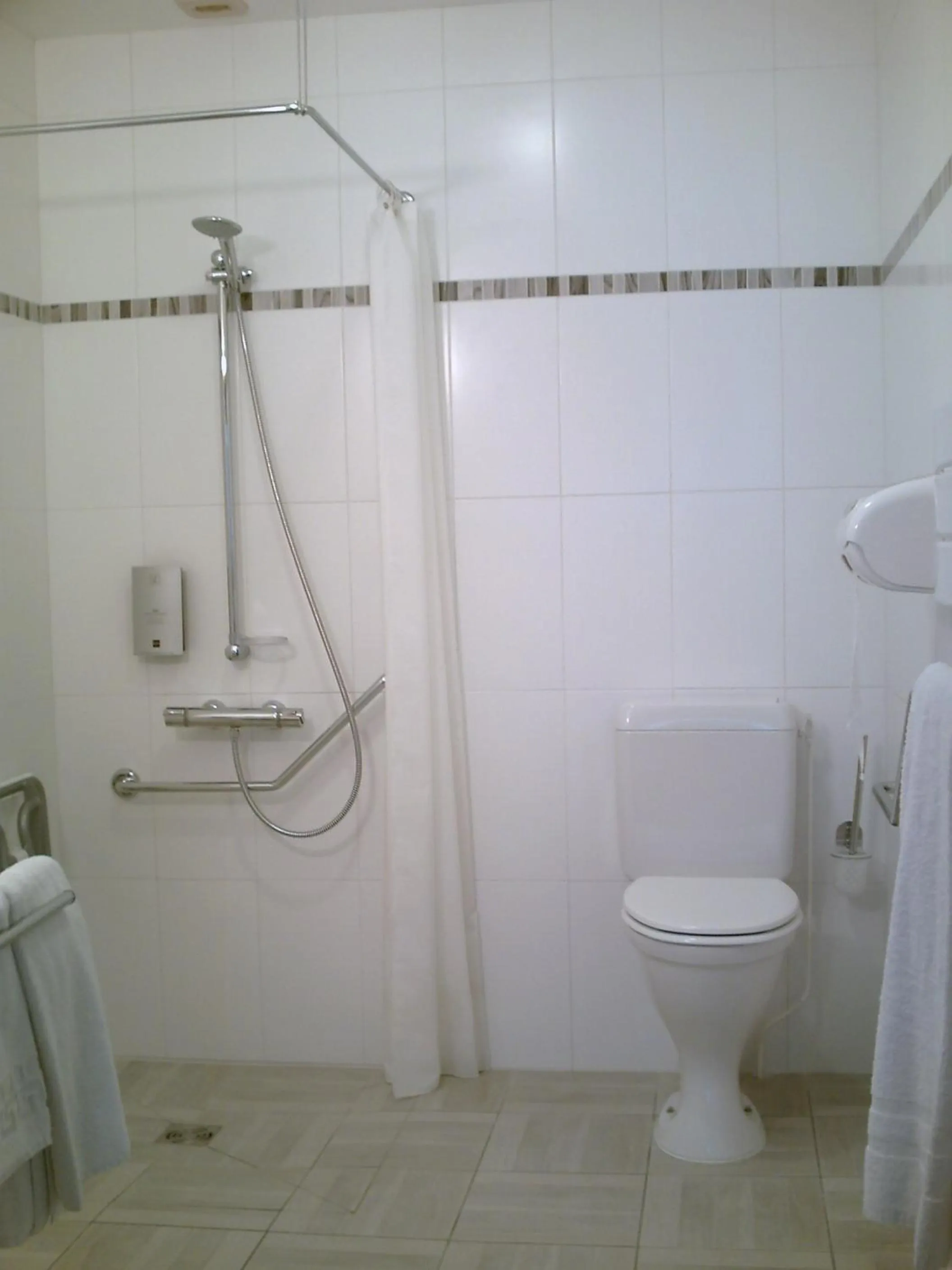 Bathroom in Logis Hôtel Restaurant L'Unique