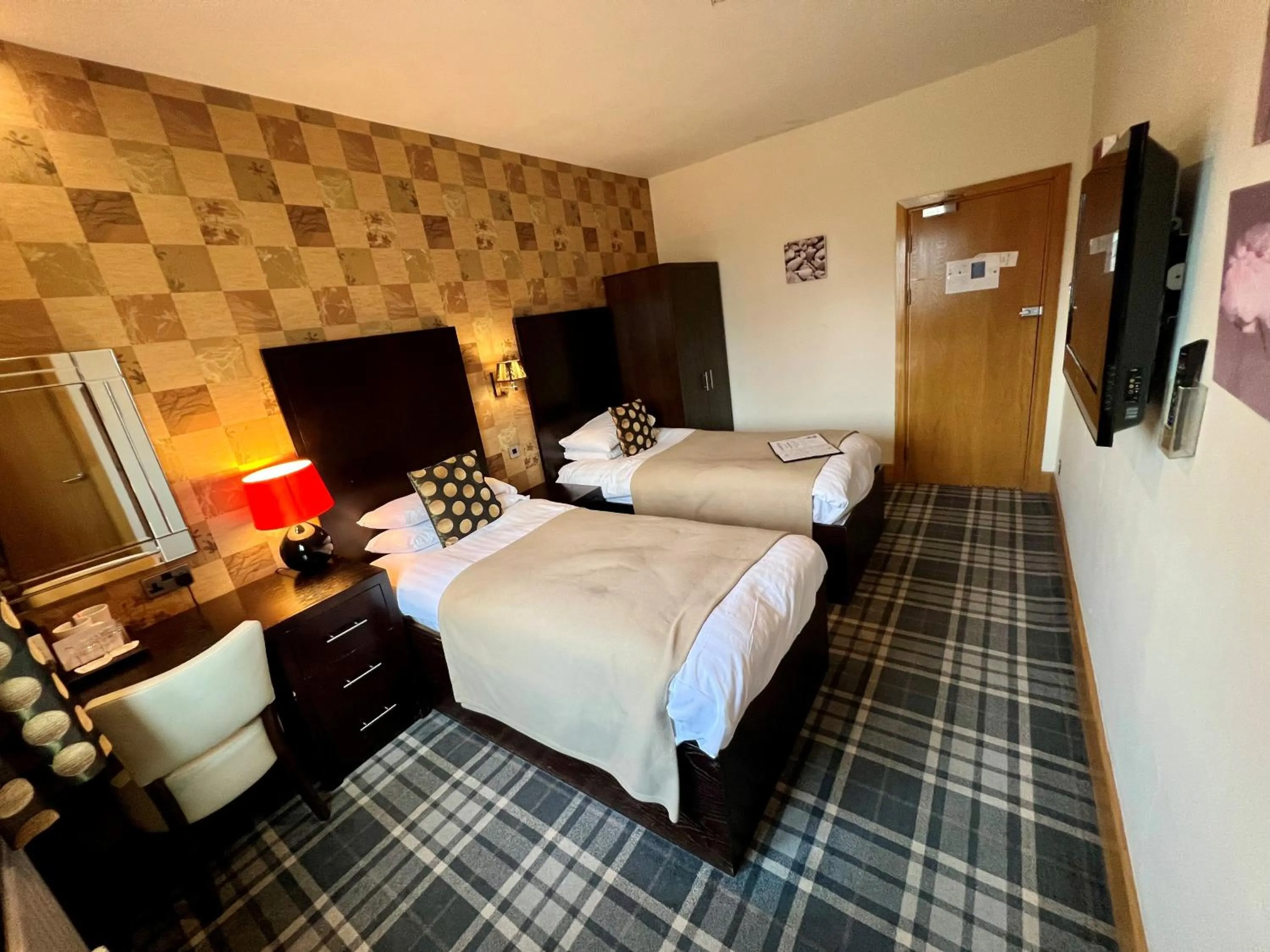 Bed in Inn On The Prom At The Fernlea Hotel