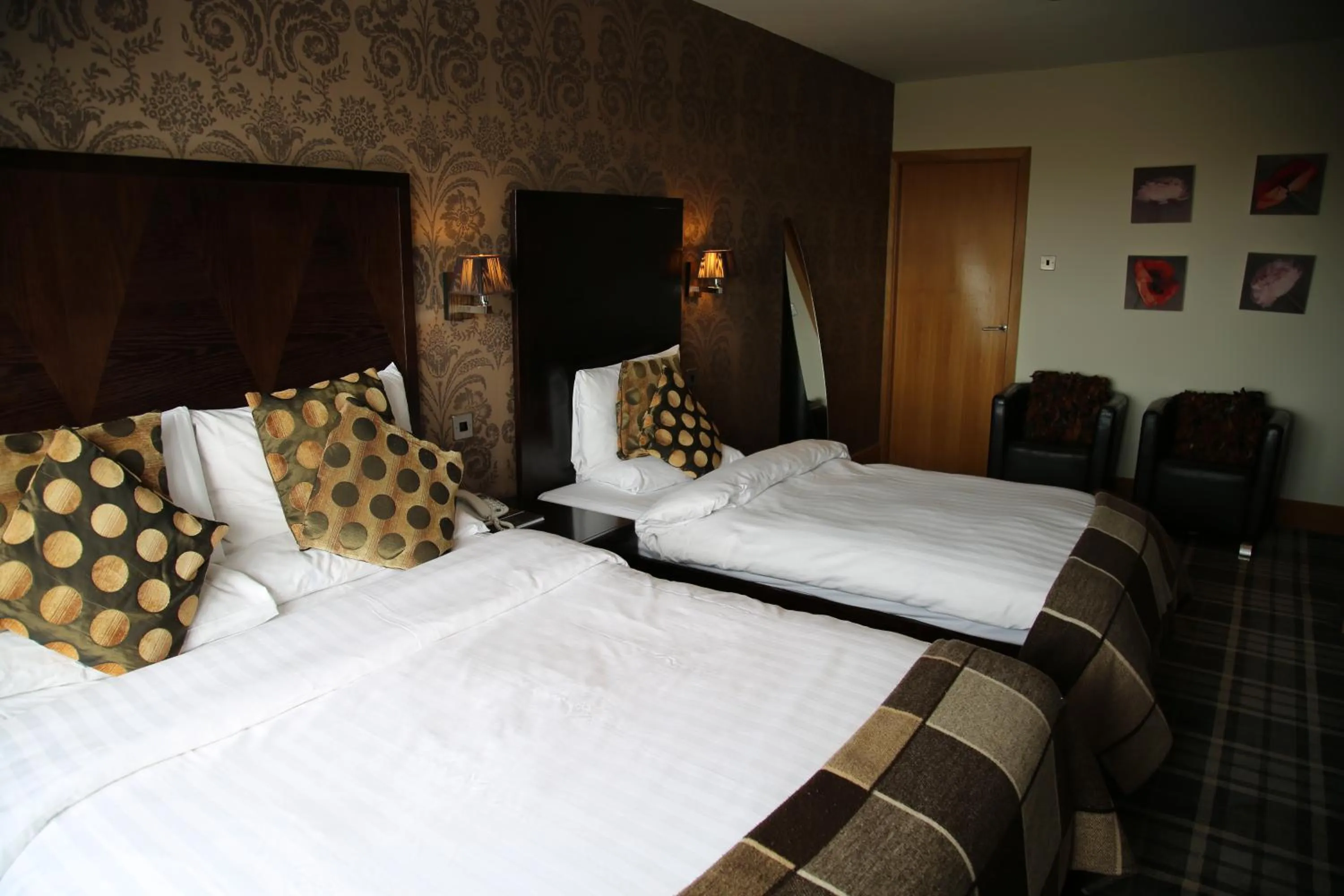 Bed in Inn On The Prom At The Fernlea Hotel