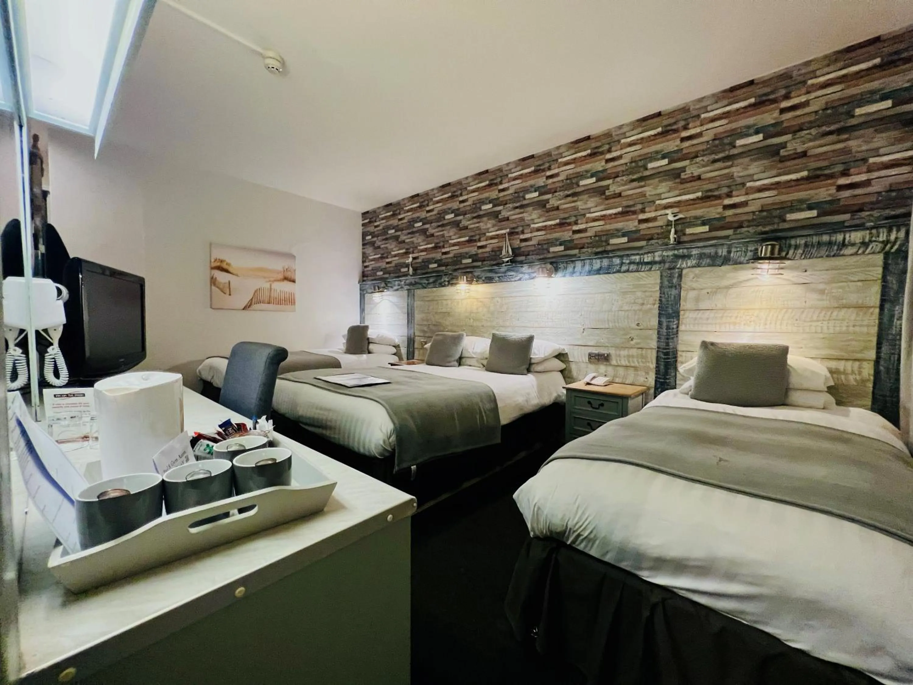 Bed in Inn On The Prom At The Fernlea Hotel