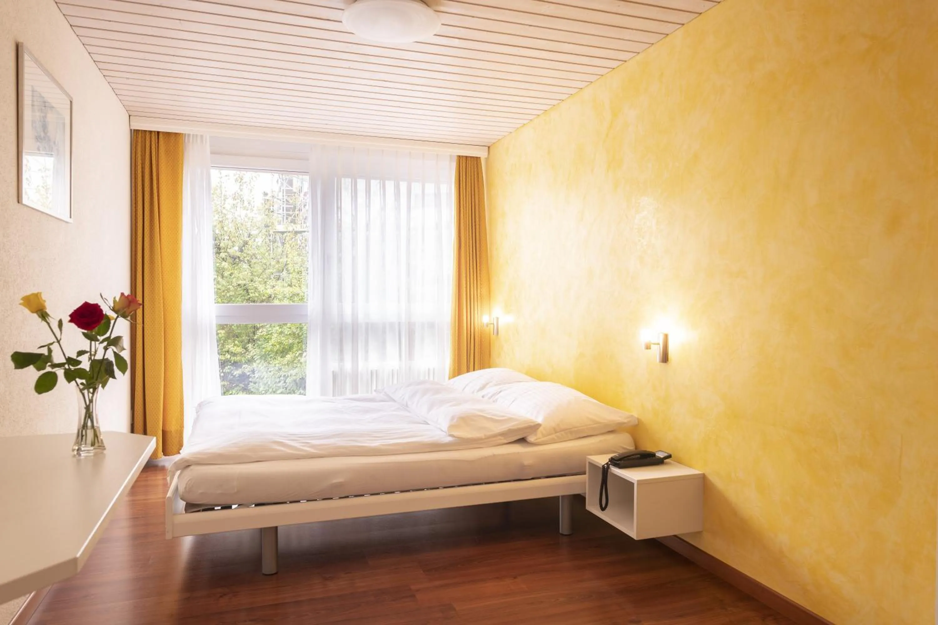 Bed in Hotel Bahnhof Zollikofen